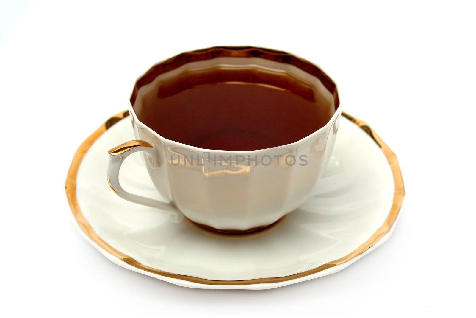 Cup of black tea on a plate, (look similar images in my portfolio)