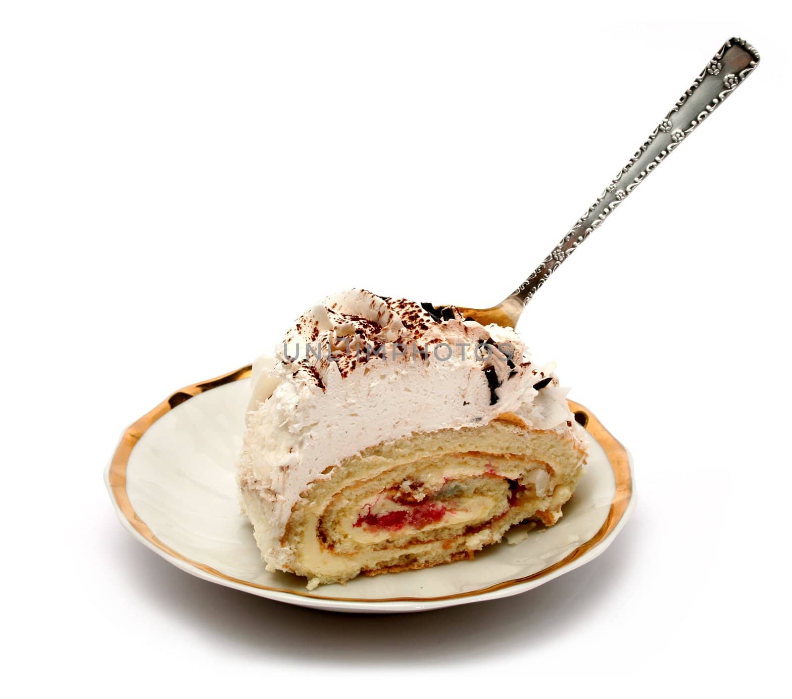 Slice of a pie on plate with the spoon 