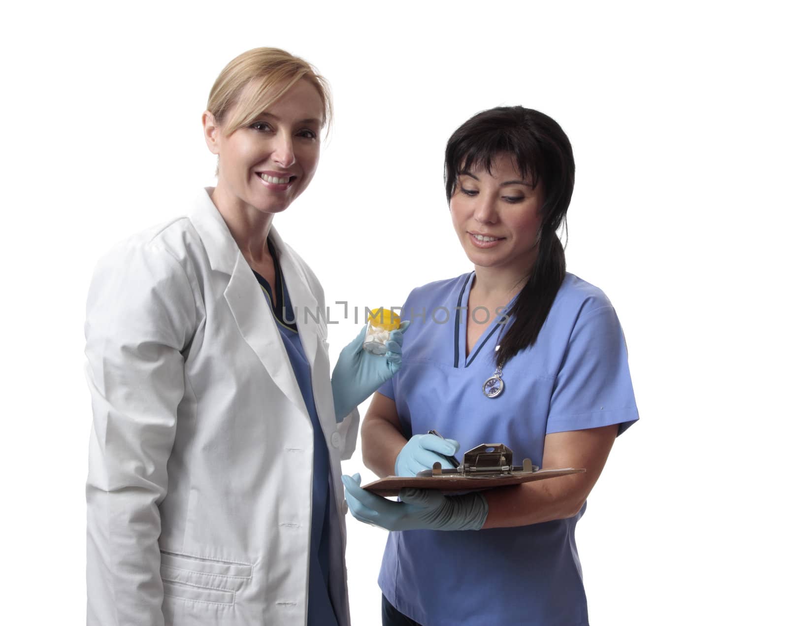 Friendly female doctors and nurses in uniform at work