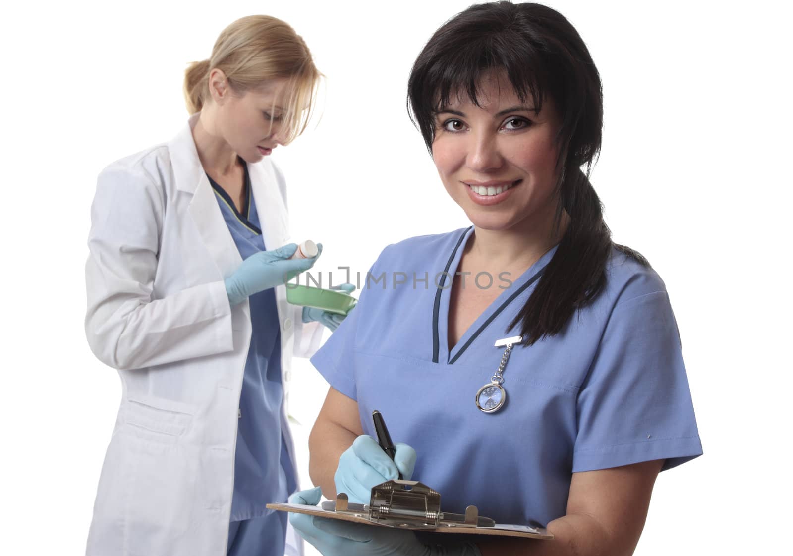 Female hospital staff in uniform at work.