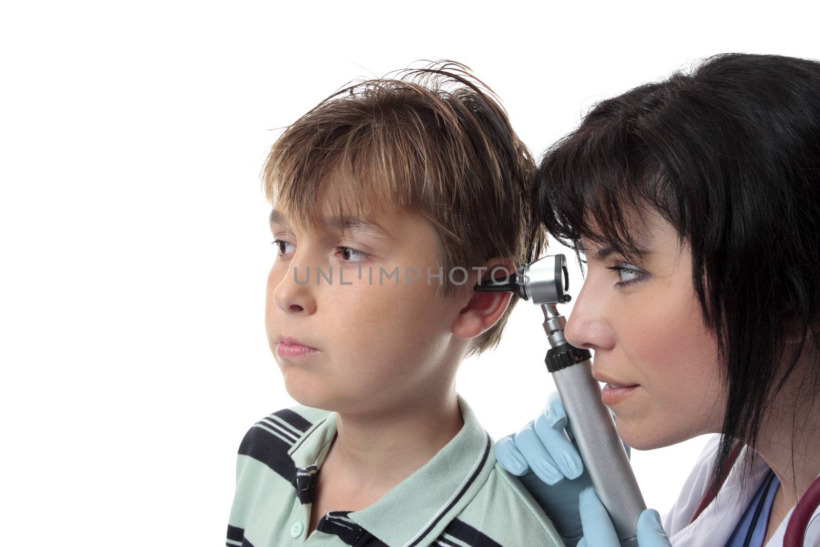 A doctor or pediatrician checks a childs ears.