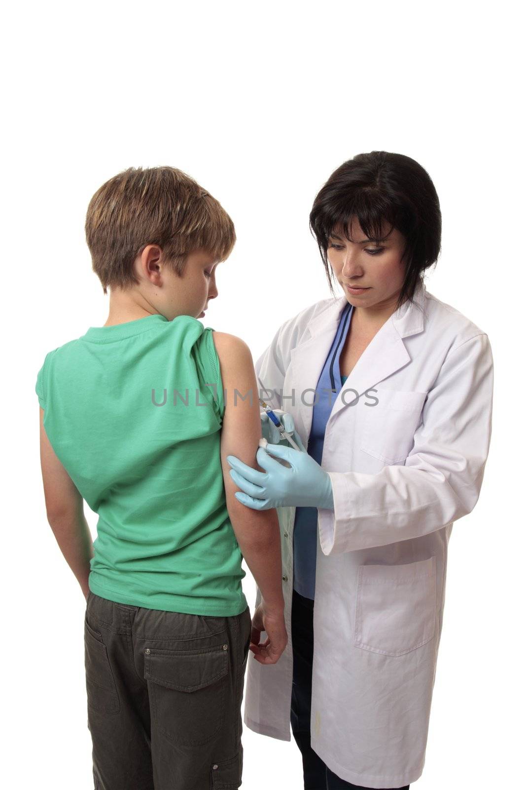 A child receives a vaccination from a doctor