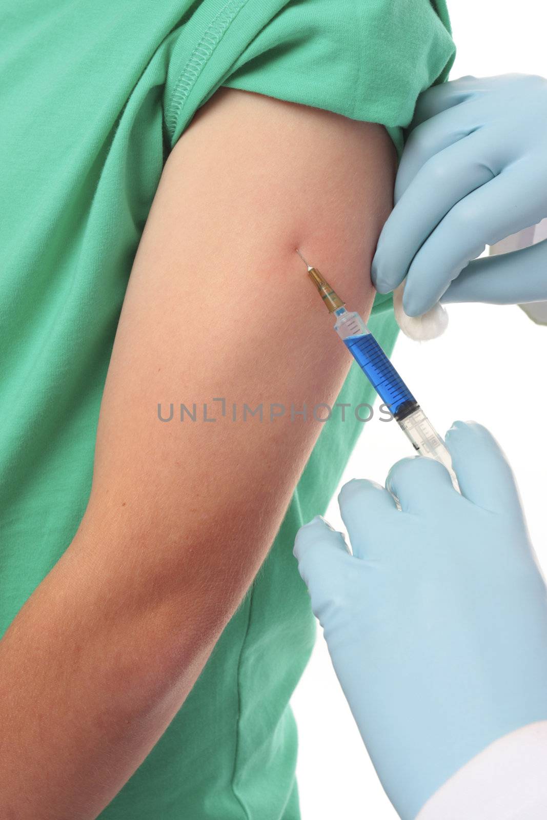 Child receiving a vaccination immunisation by a doctor.