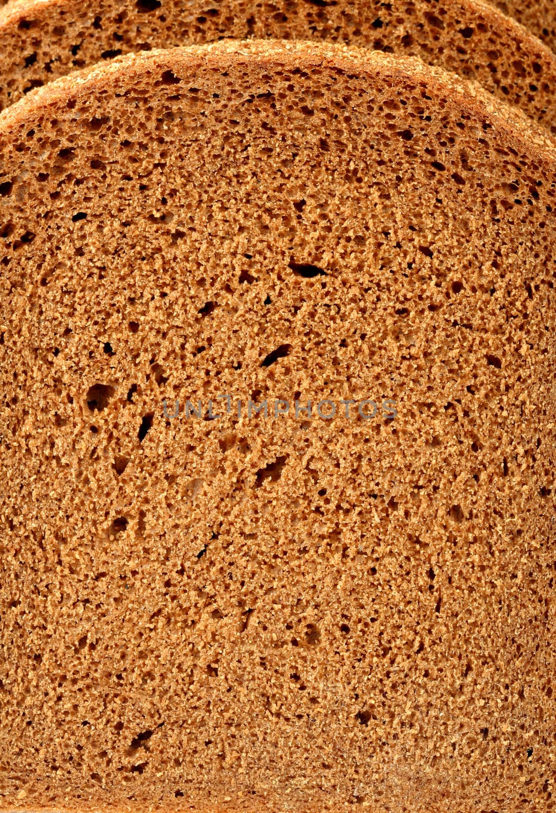 Cut of a rye bread, background
