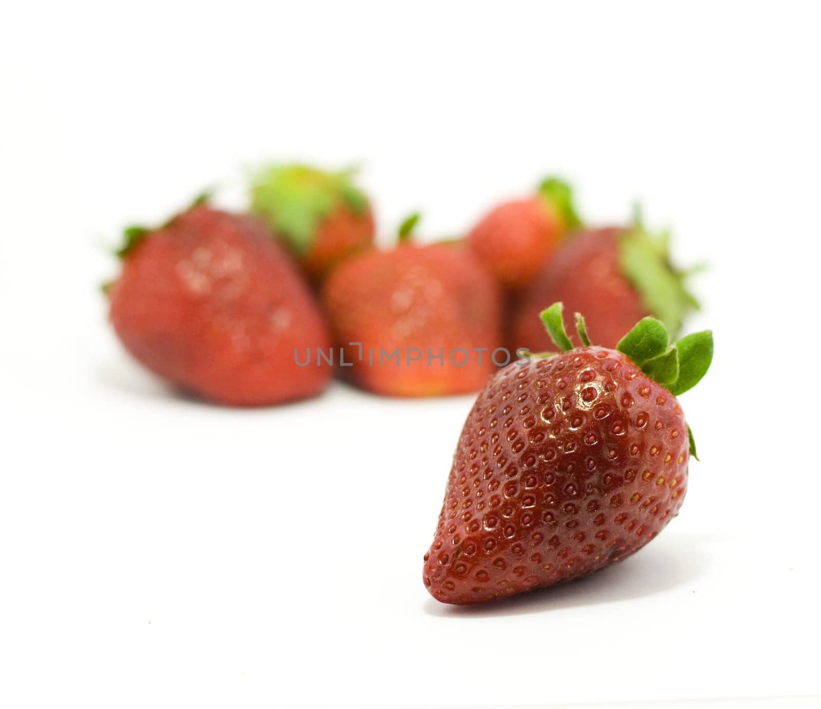 Strawberries isolated on white by ursolv