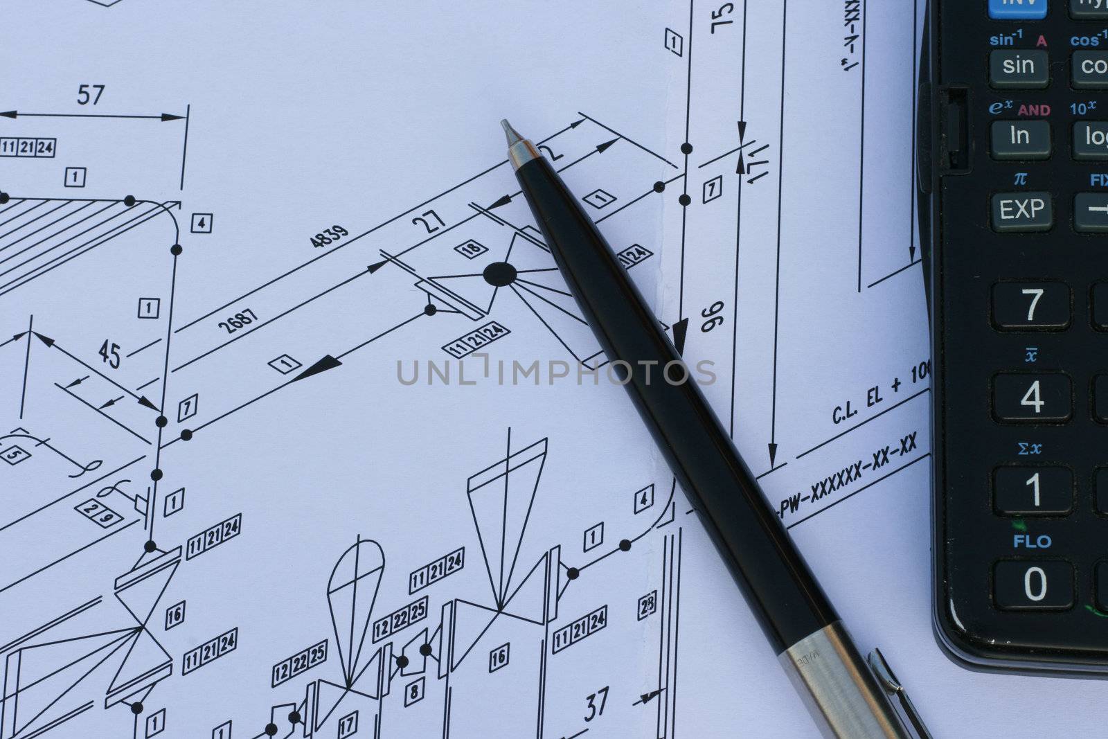 Isometric Drawing of Piping arrangement Drawings with calculator and pen