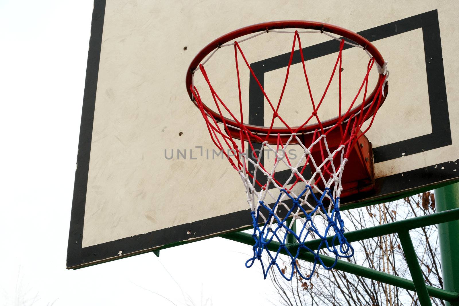Basketball Ring Hoop with net and sky background - with copy space