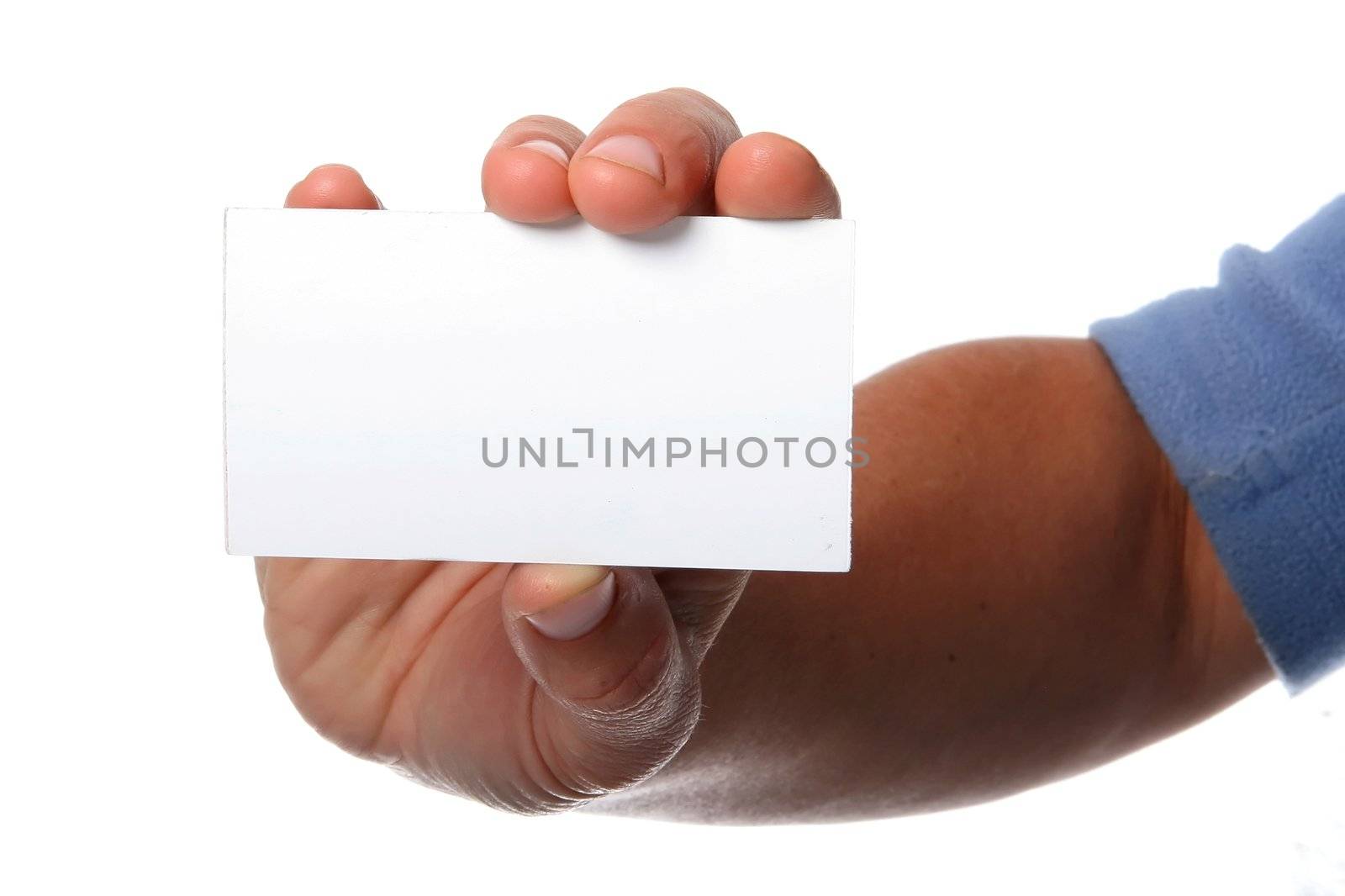 Womans hand holding a blank card in her fingers