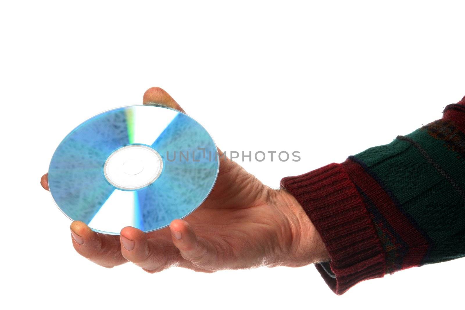 Man's hand holding a compact disk in his fingers