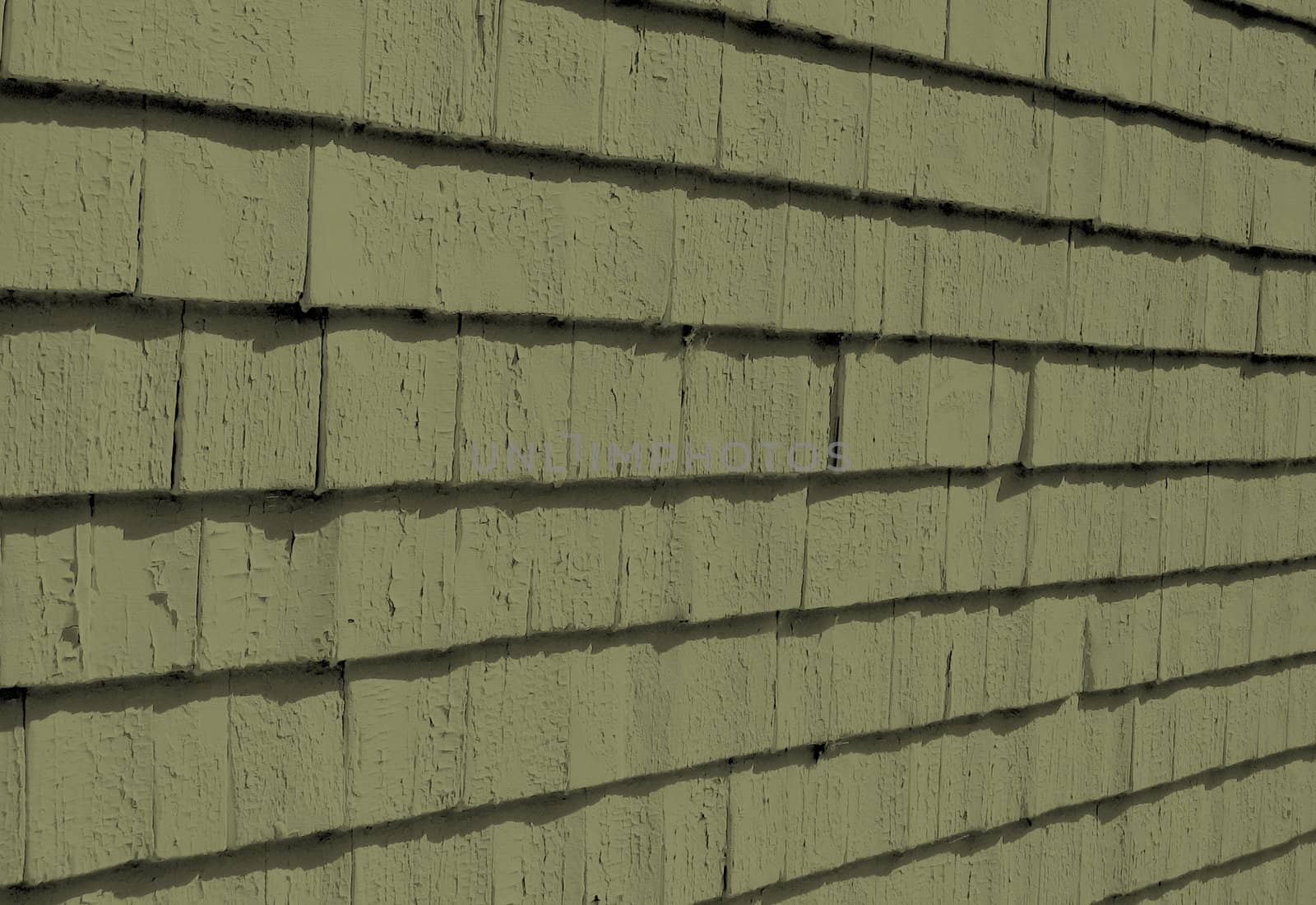a old wall of wood shingles, painted soft green, background and design