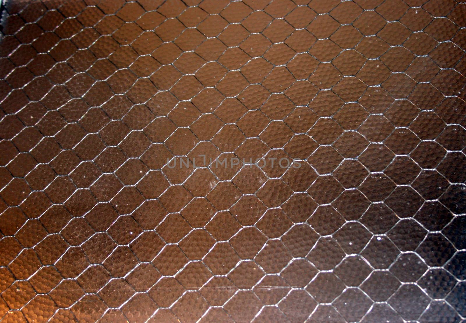 a window panel of safety glass with embedded wire