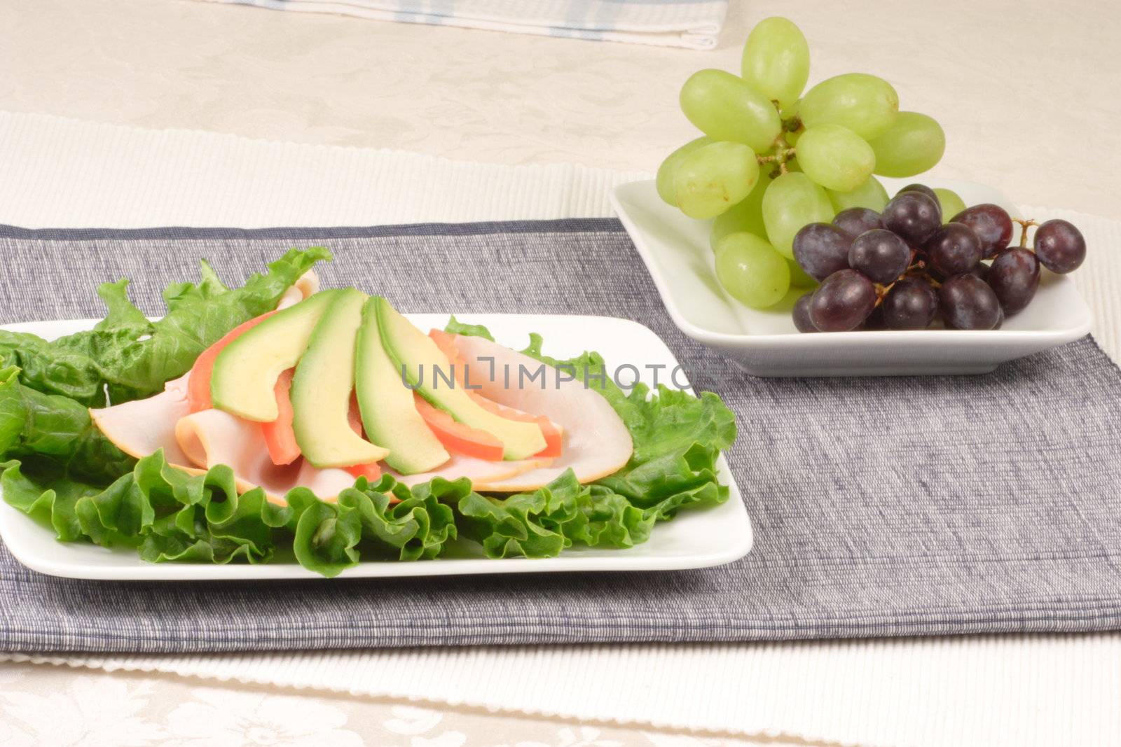 lettuce sandwich and grapes by tacar