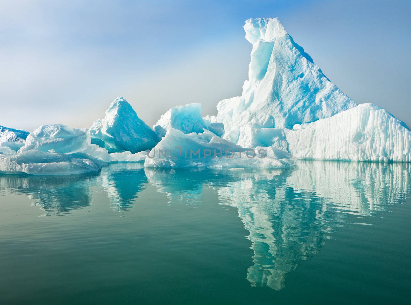 Icebergs Floating in Calm Water by abey