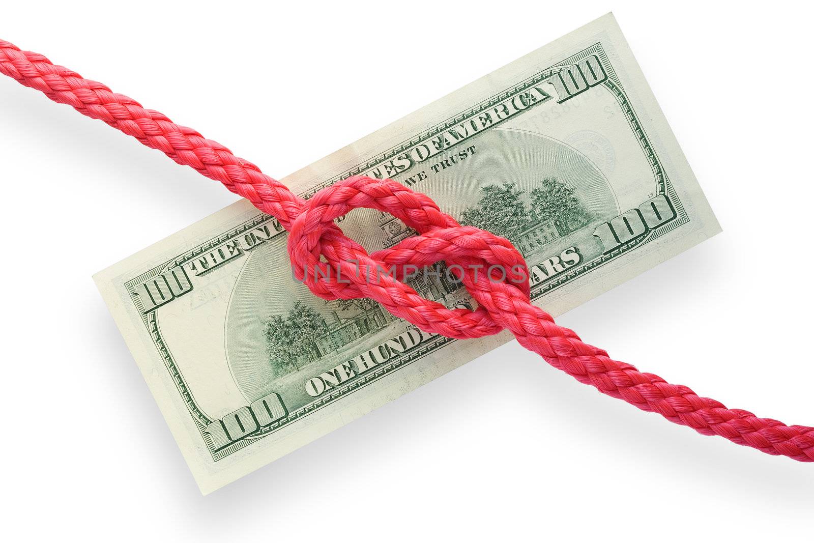 The red cord with reef knot on a banknote. Isolated on white. Conception of risk or difficulty.