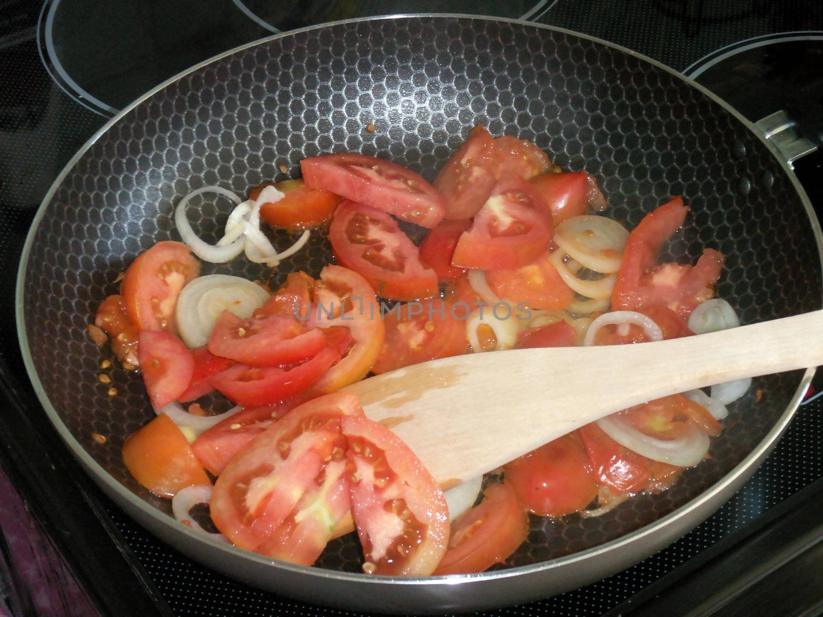Vegetables on a frying pan for preparation of an omelette