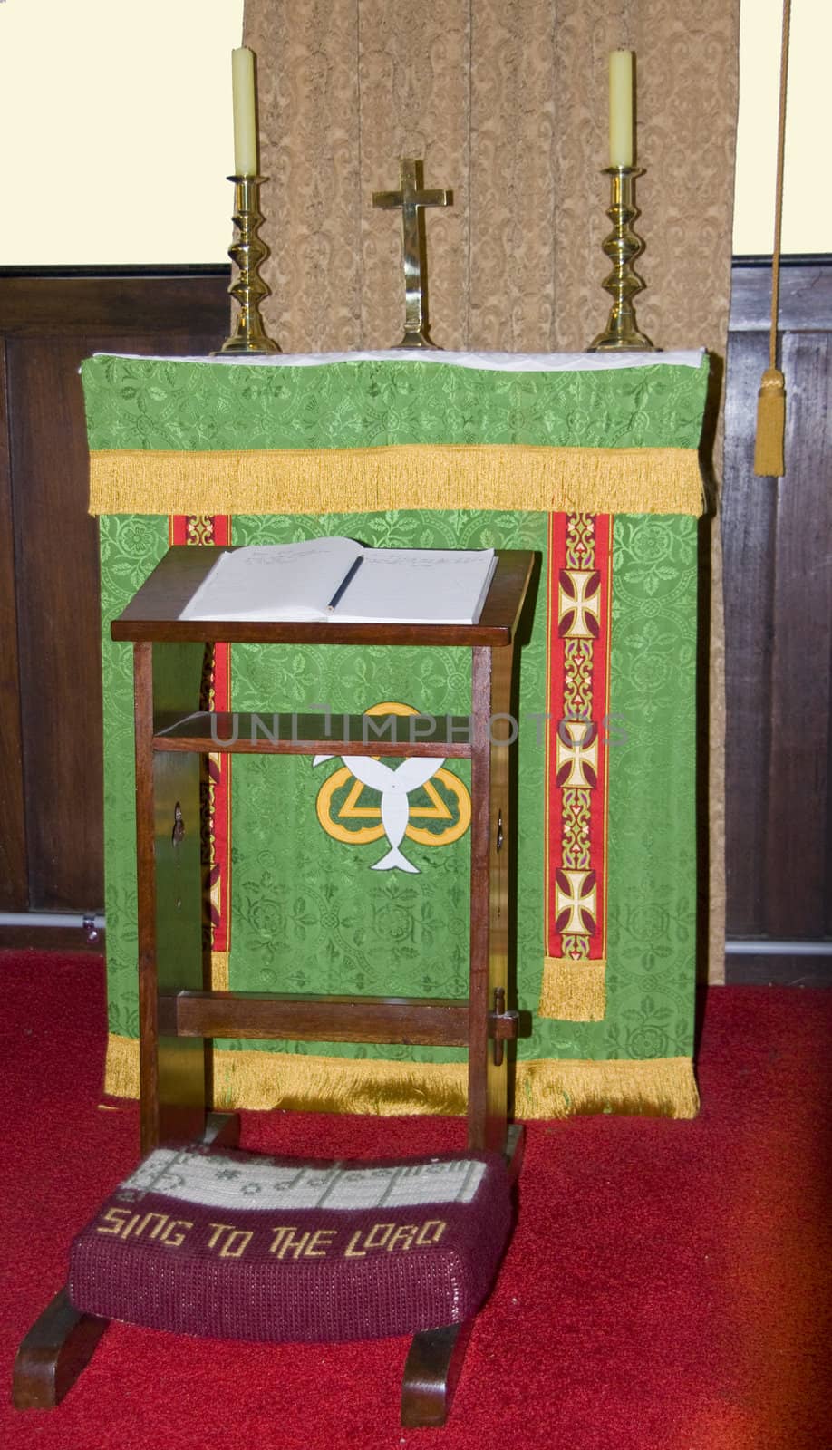 Small side altar with chair to kneel in a Christian church in Albany, Australia.