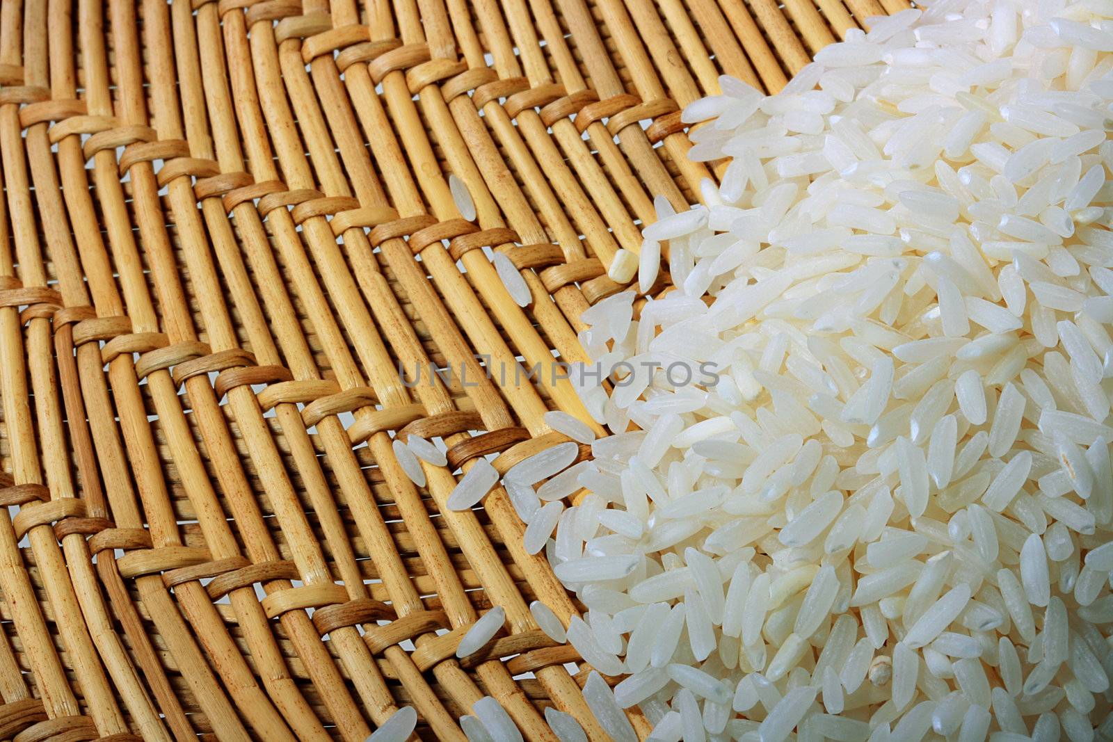 Rice on a mat from straw - a traditional dish of many people.