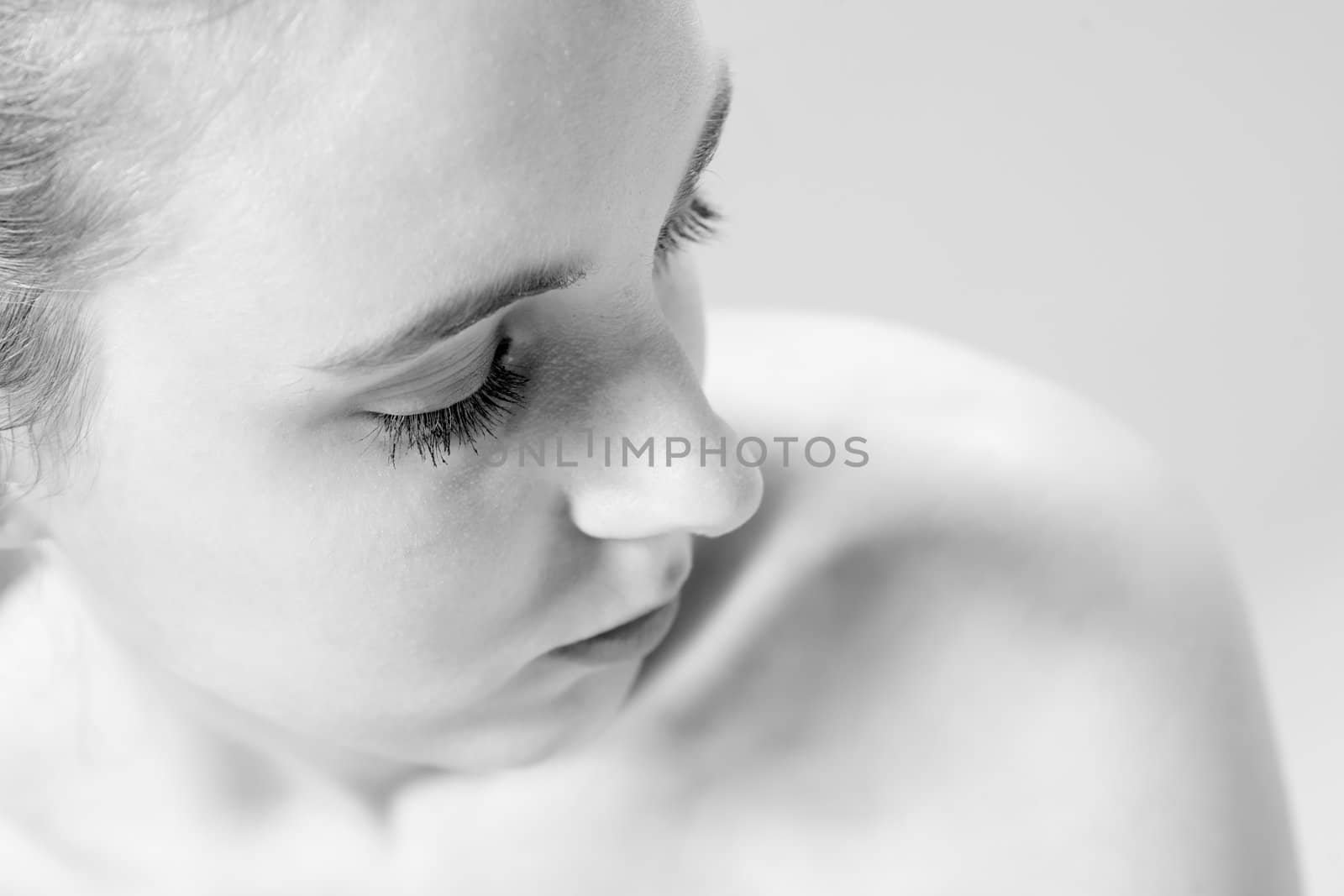 Studio close up portrait of a beautiful woman