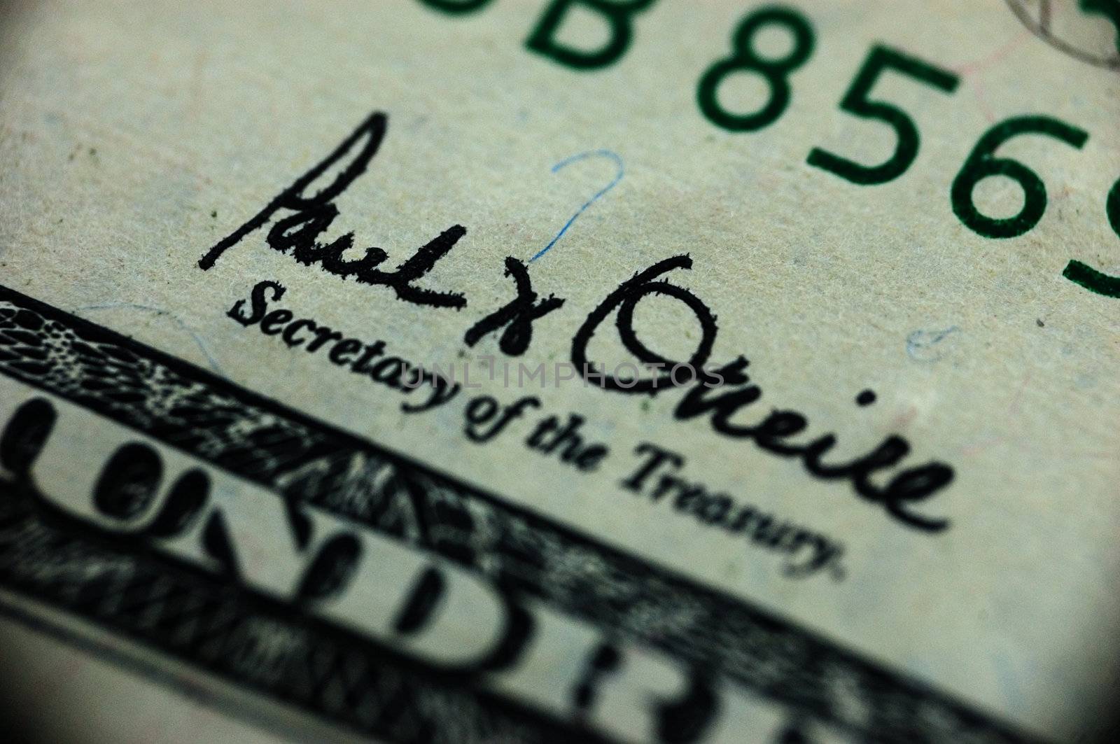 macro of one handred dollars - sign of Secretary of the treasury