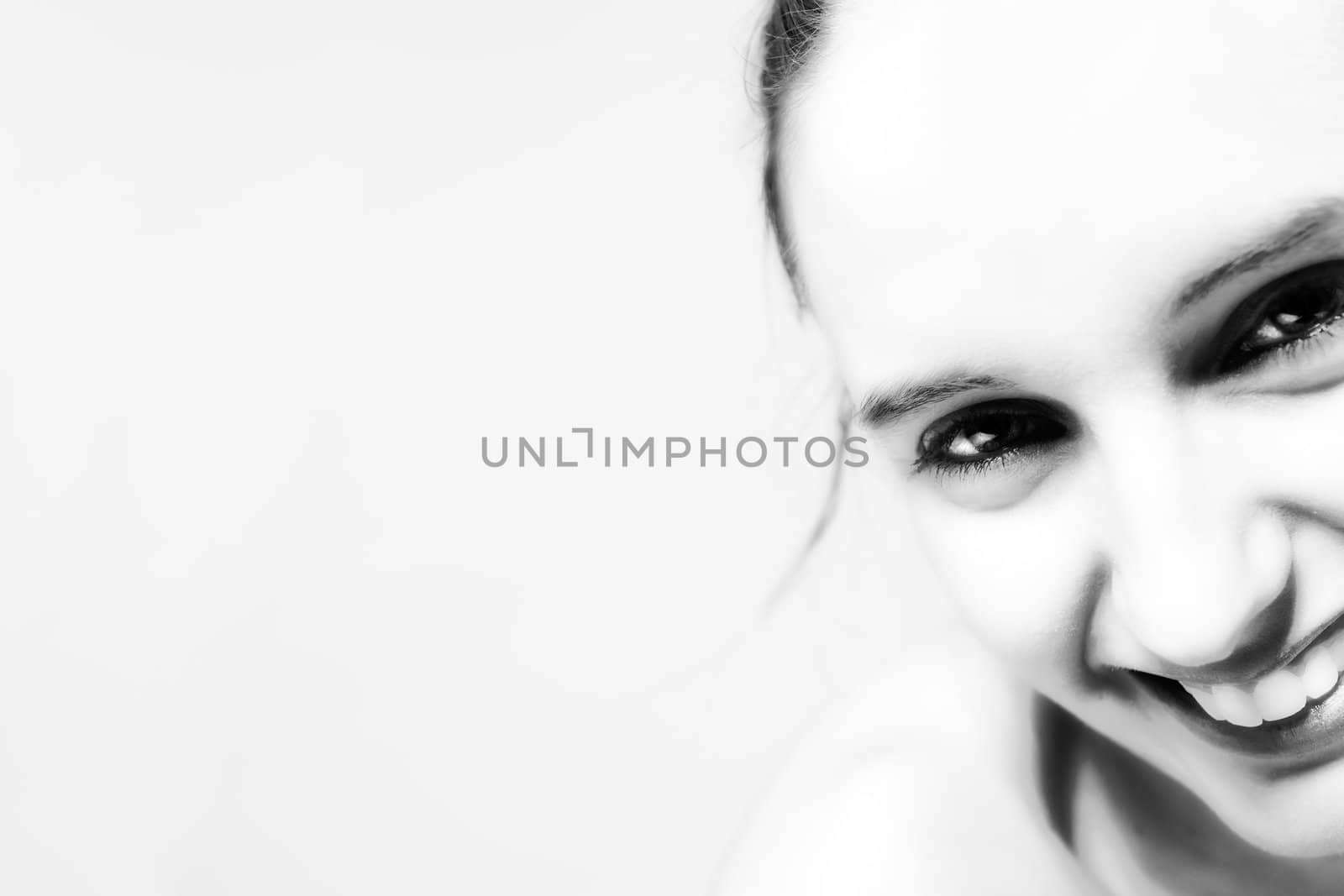 Studio close up portrait of a beautiful woman