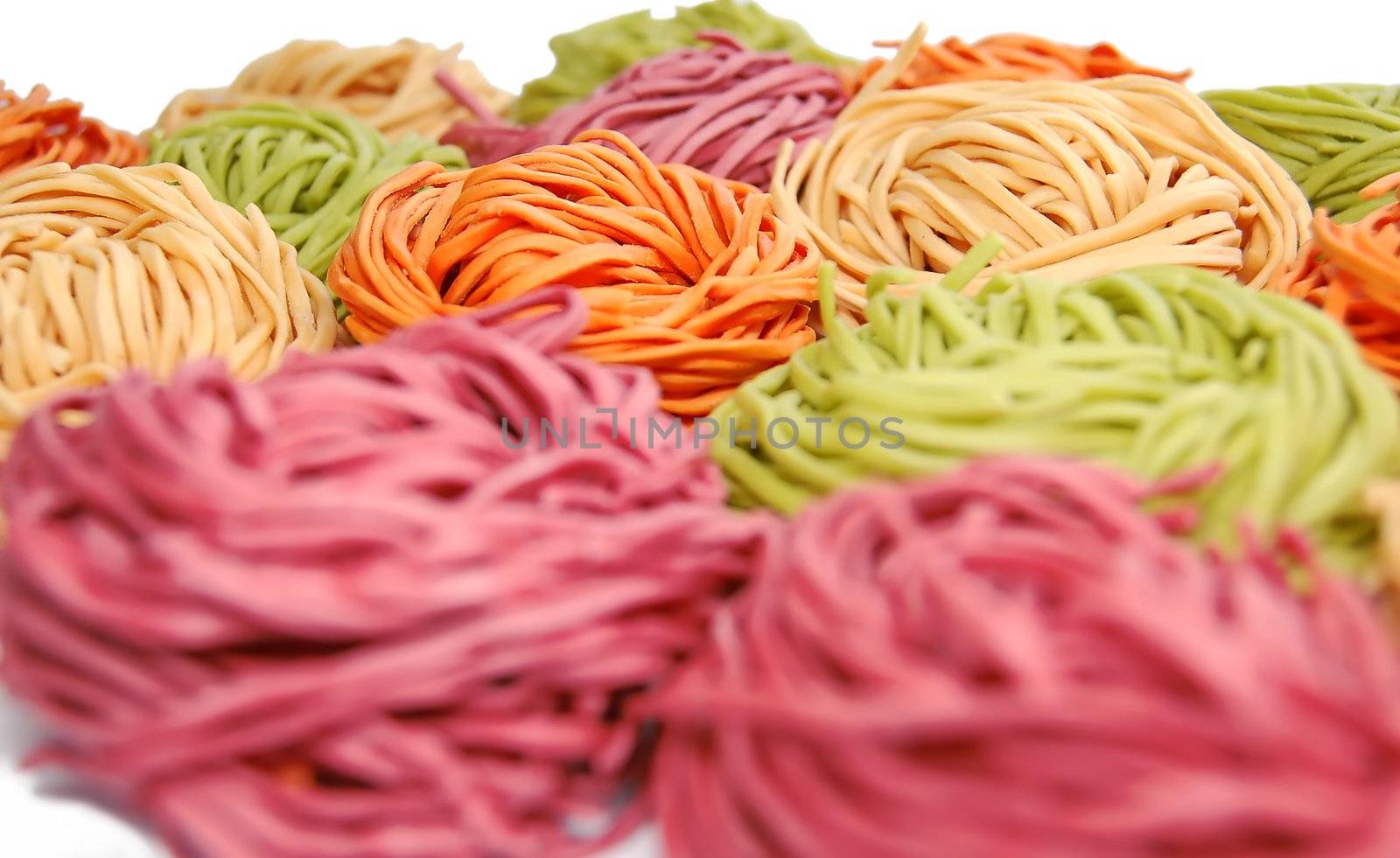 colored pasta or colored noodles redy for cooking