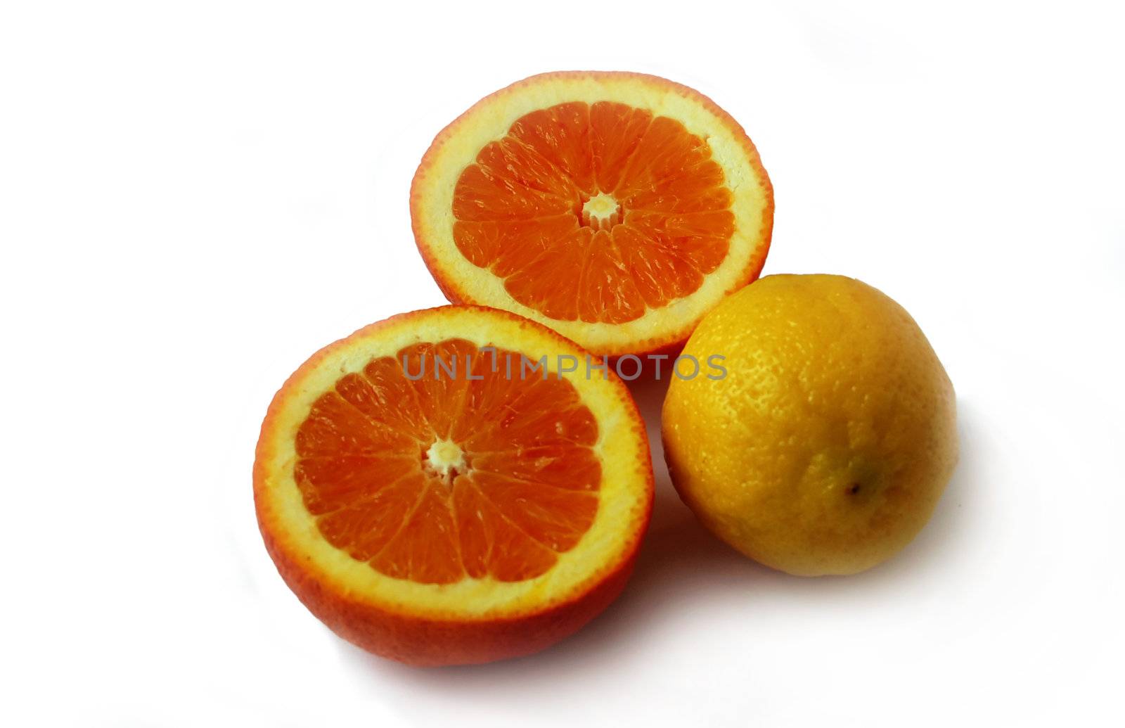 colored slices of orange and lemon with rough surface pattern isolated on white with shadows