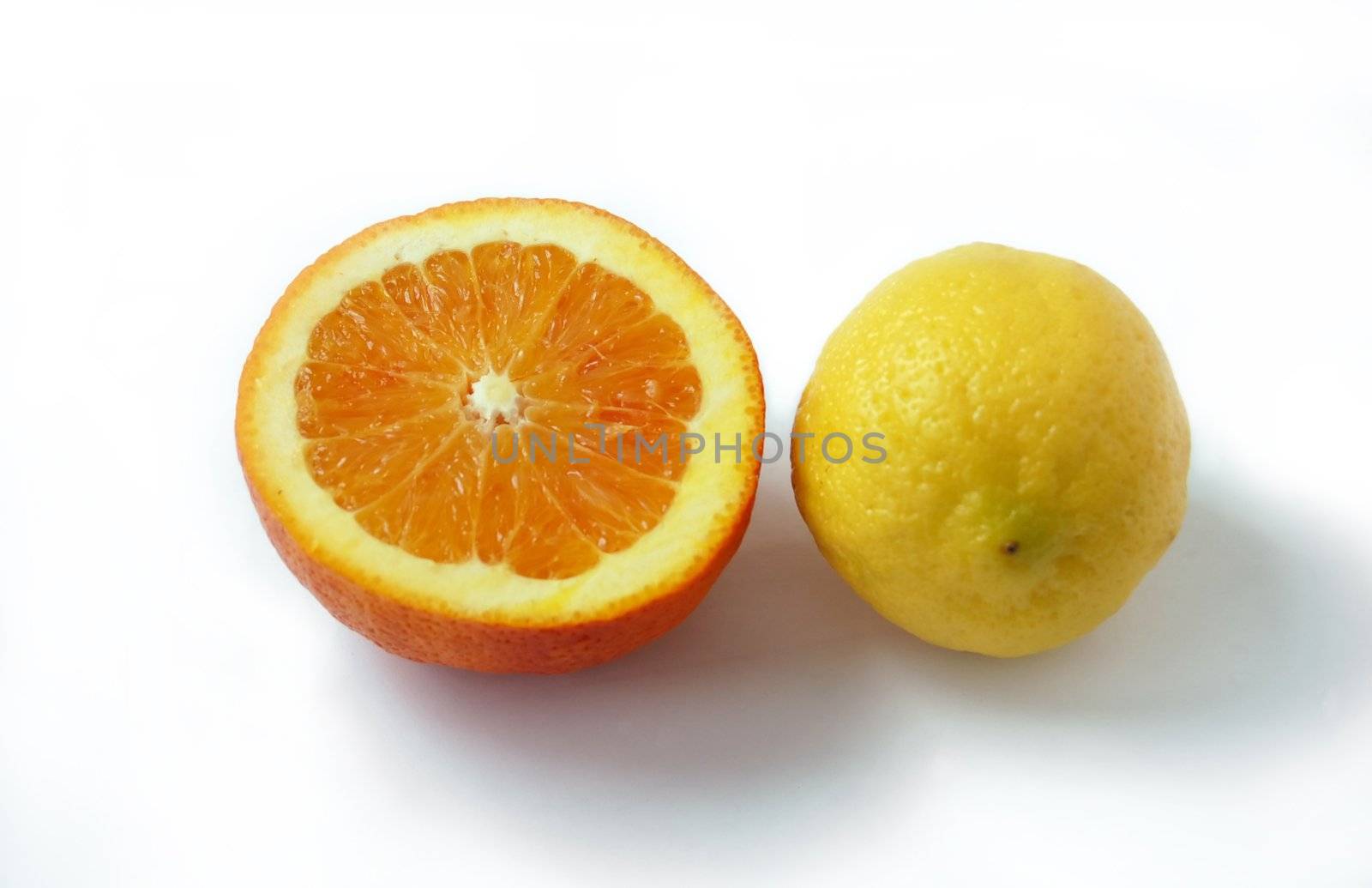 colored slice of orange and lemon with rough surface pattern isolated on white with shadows