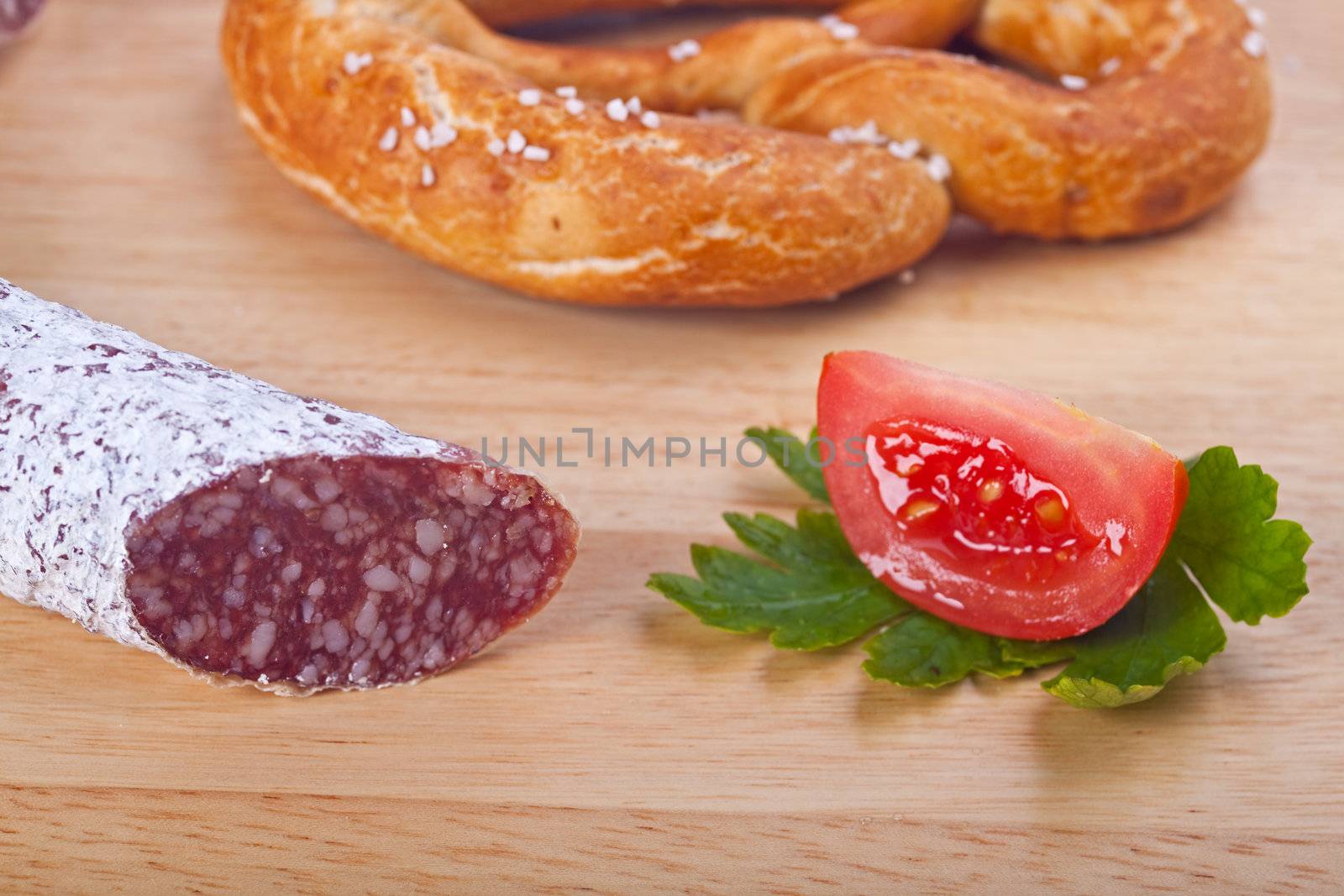 closeup of a salami sausage by bernjuer