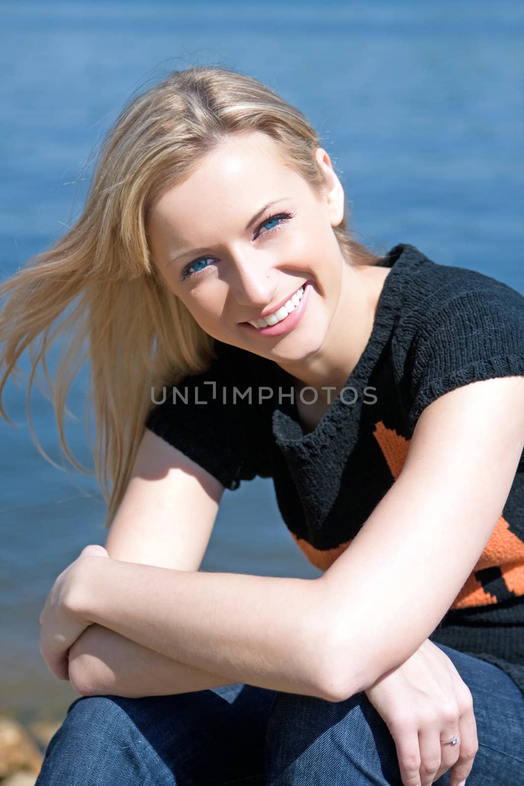 The beautiful girl on the bank of the river by MIL