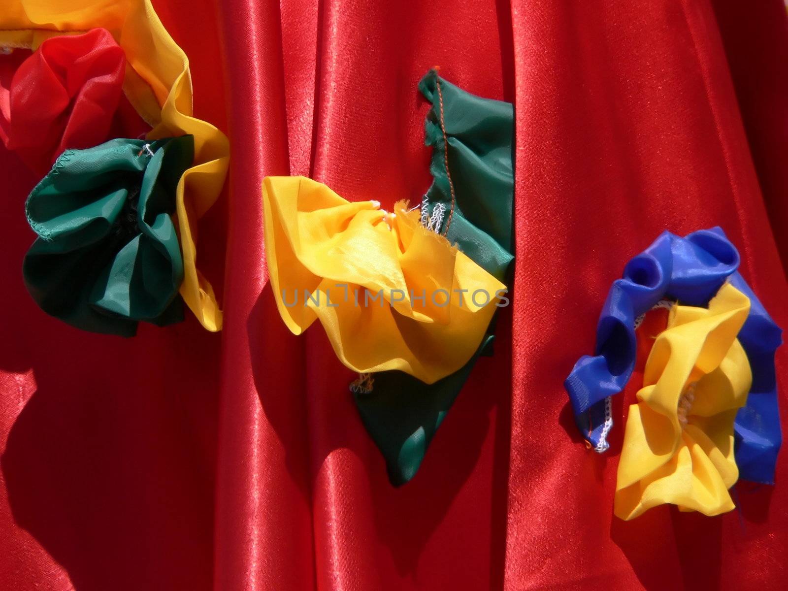 Part of red dress with yellow flowers