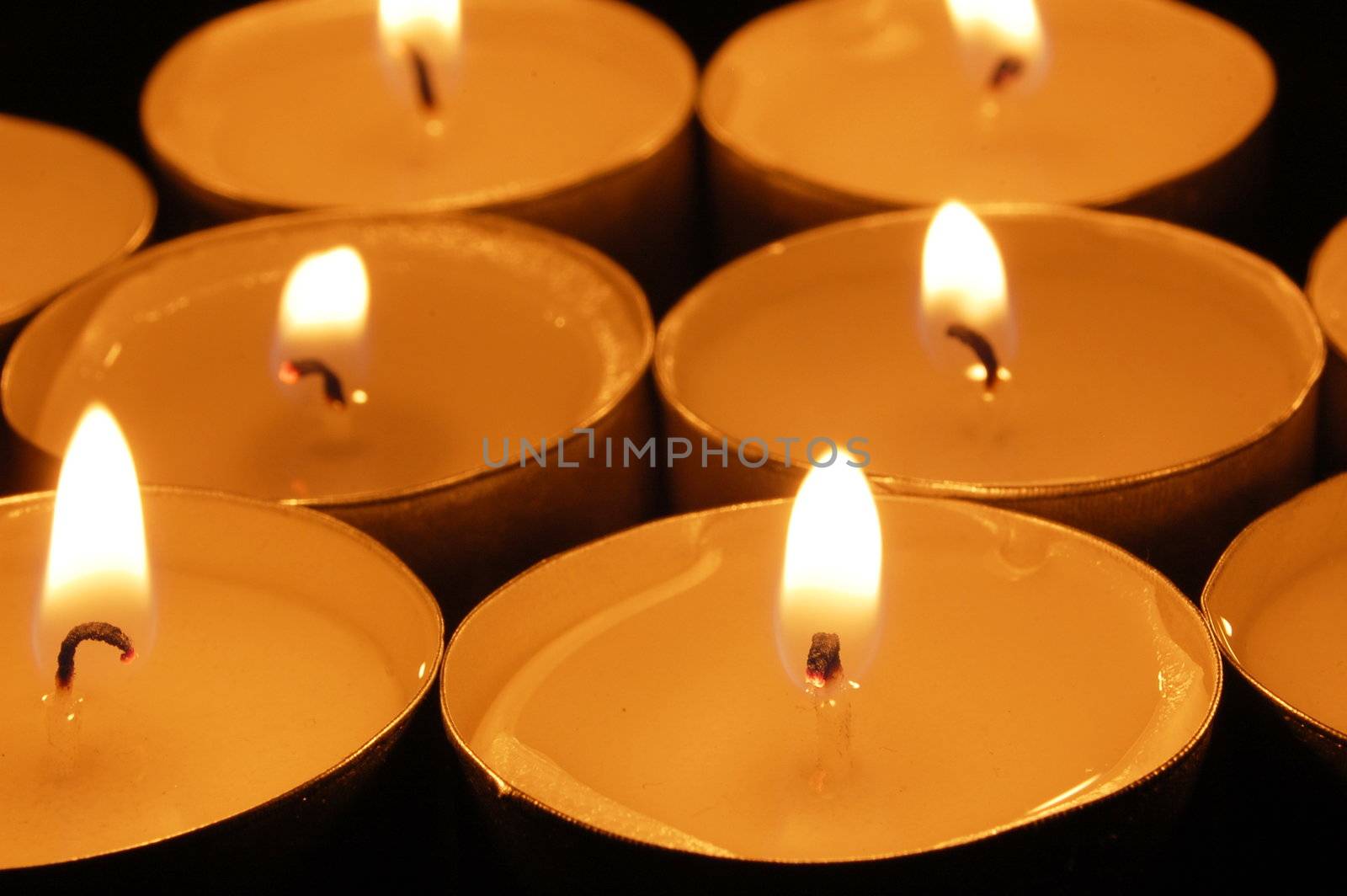 romantic hot candle light on black background