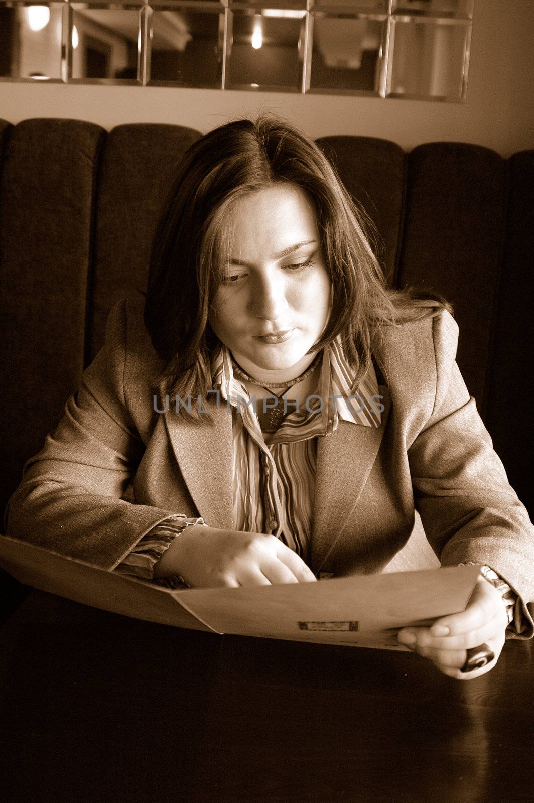 Woman reading the menu