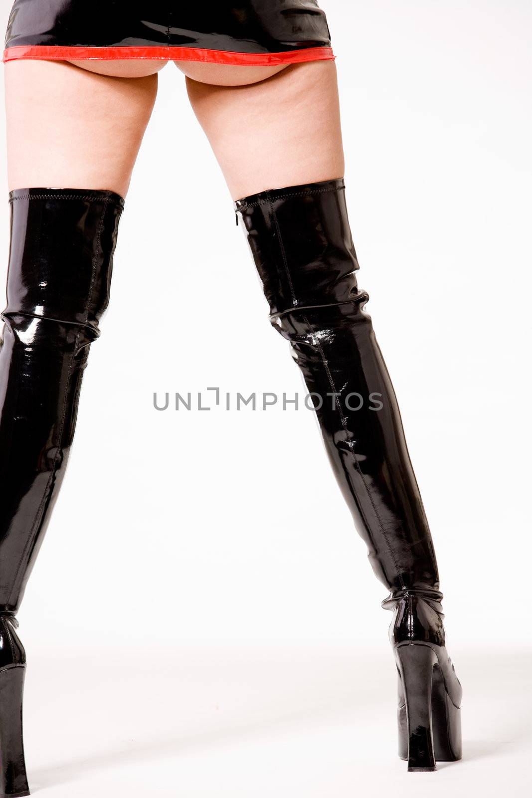 Long legs in leather boots by DNFStyle