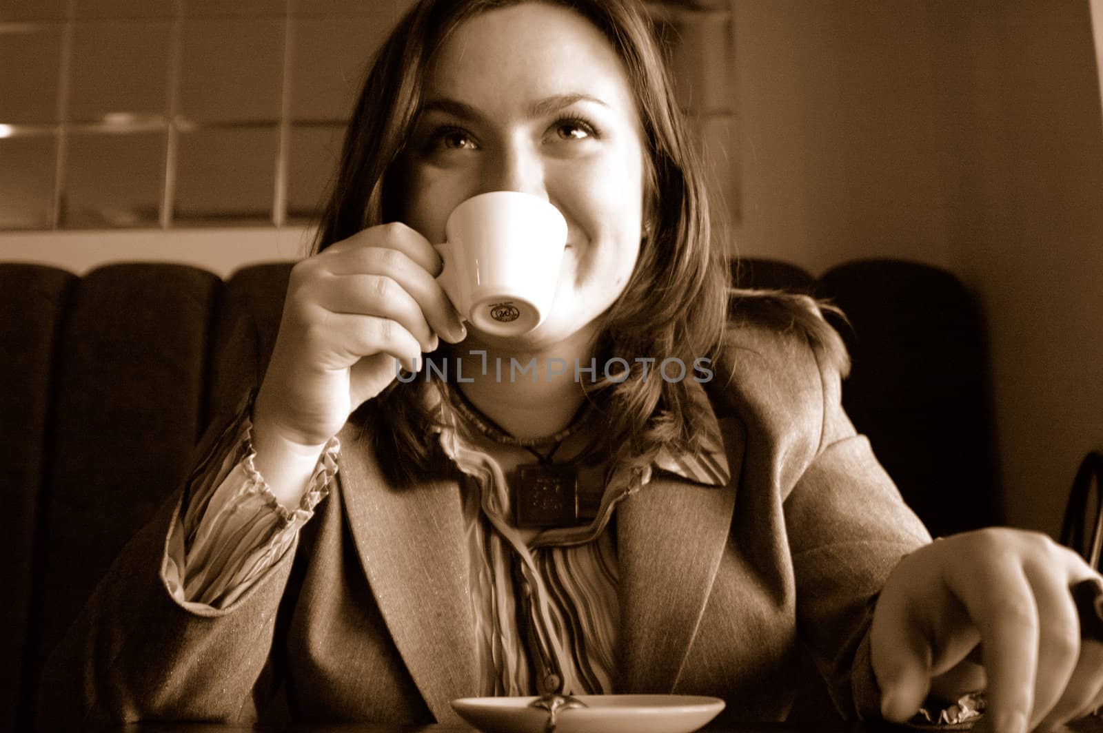 Woman drinking a cup of coffee