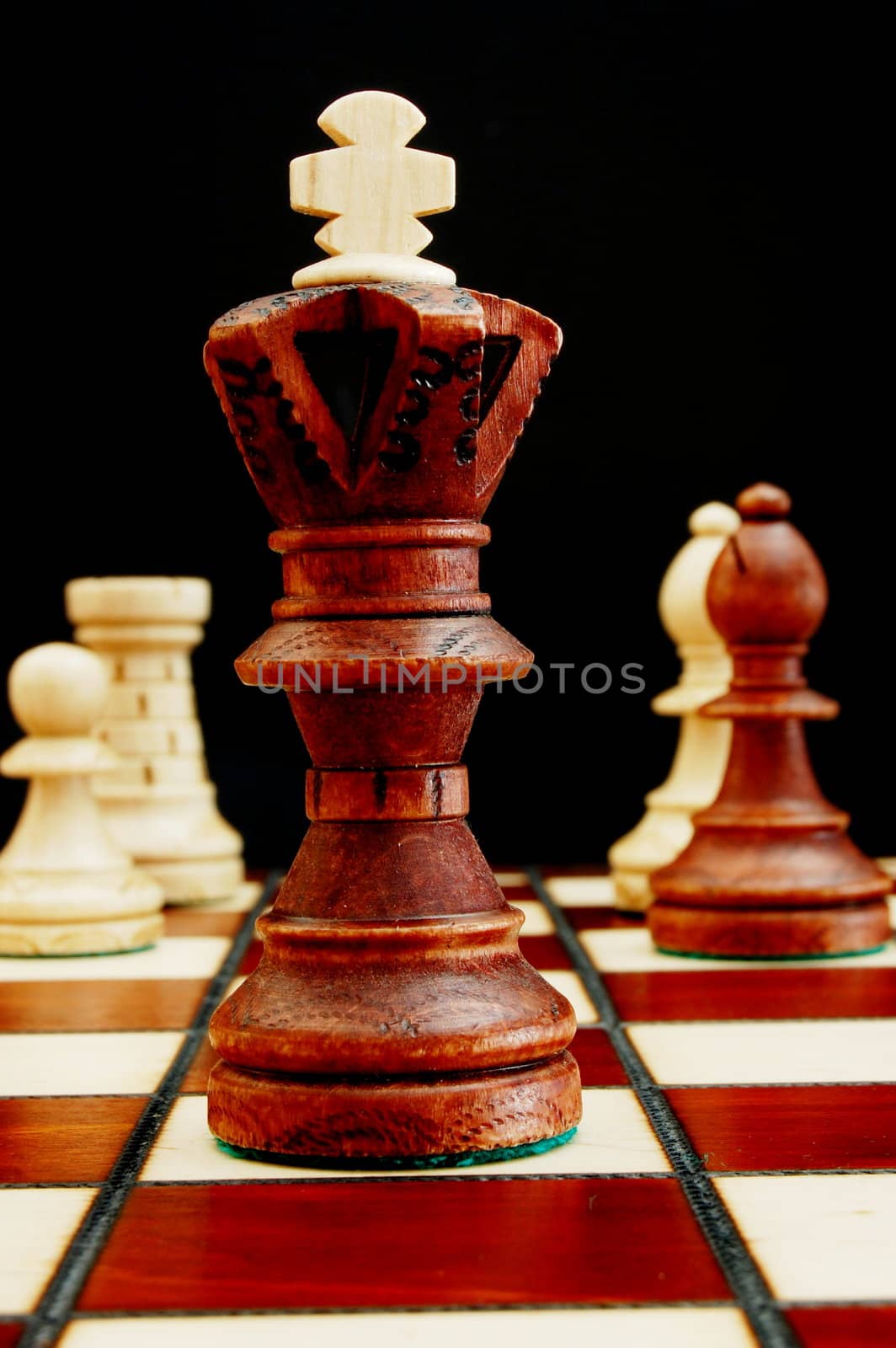 chess pieces showing power competition conflict and strategy in business