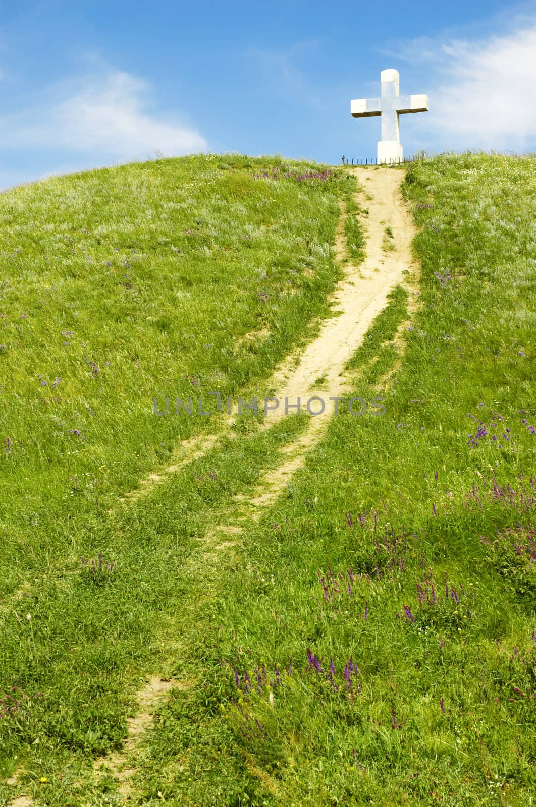 path to the cross on the green hill