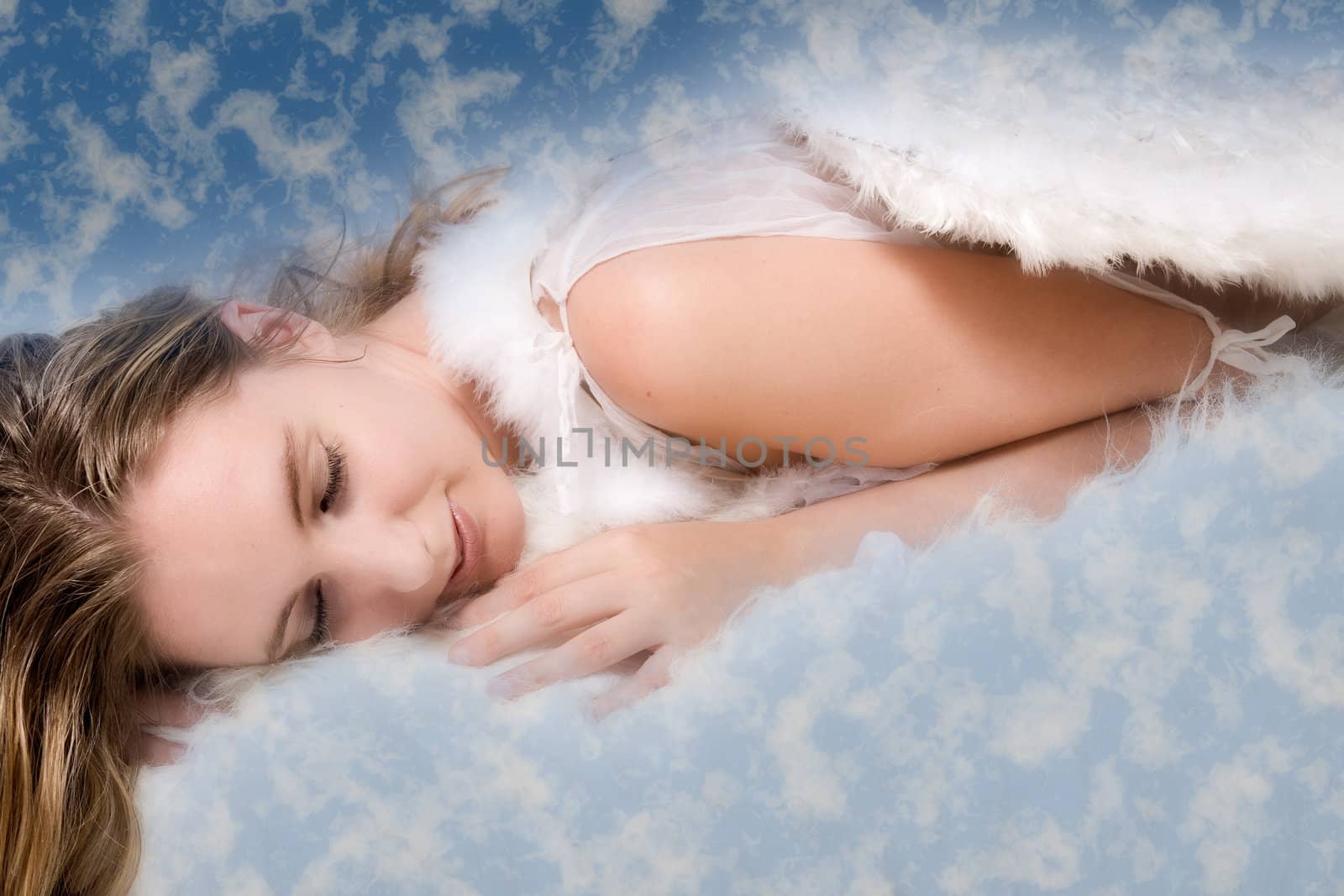 Portrait of an angel in the clouds looking happy