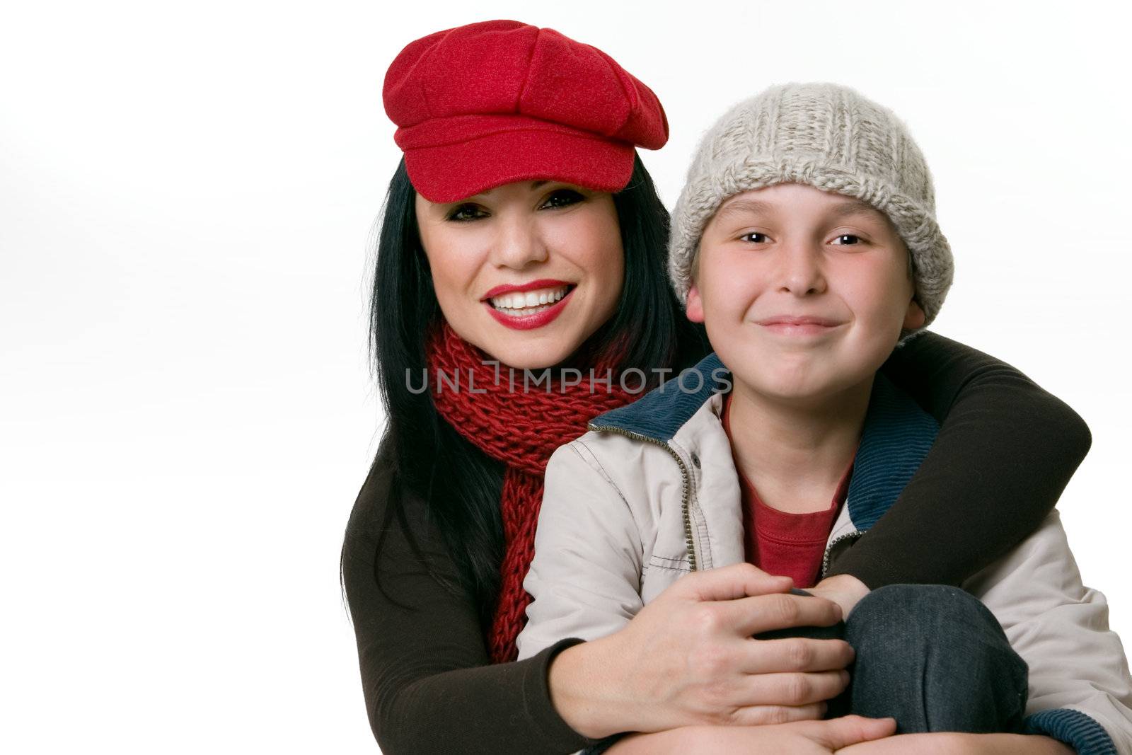 Child and mother casually dressed and smiling.