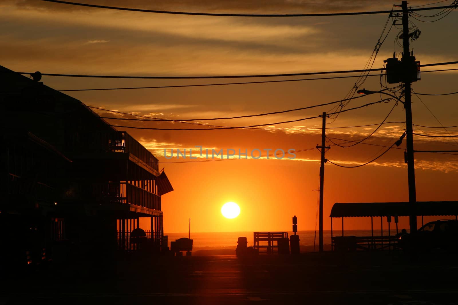 A sunrise / sunset scene at a Maine beach town.