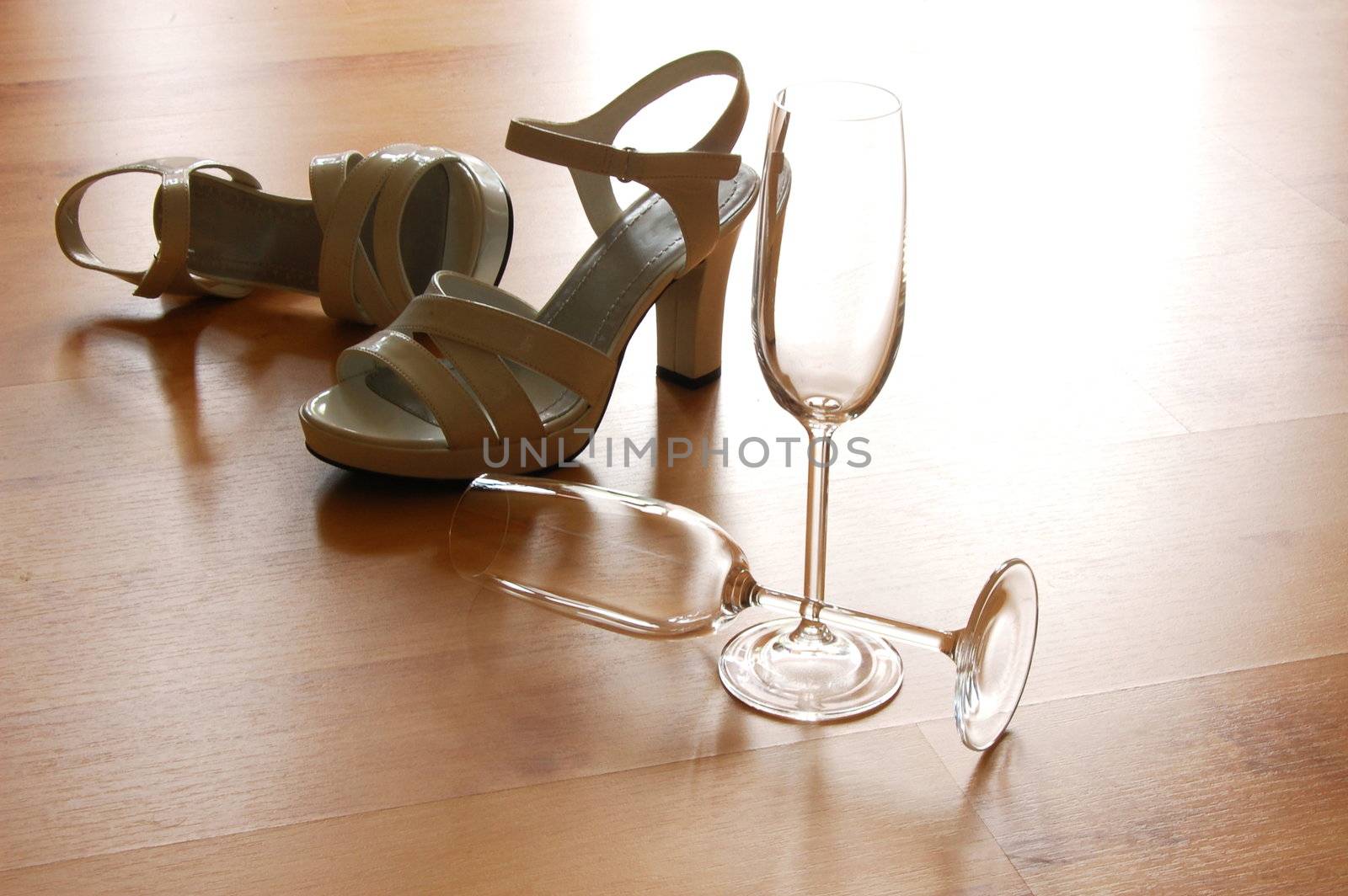 sexy high heels and champange or sparkling wine glass