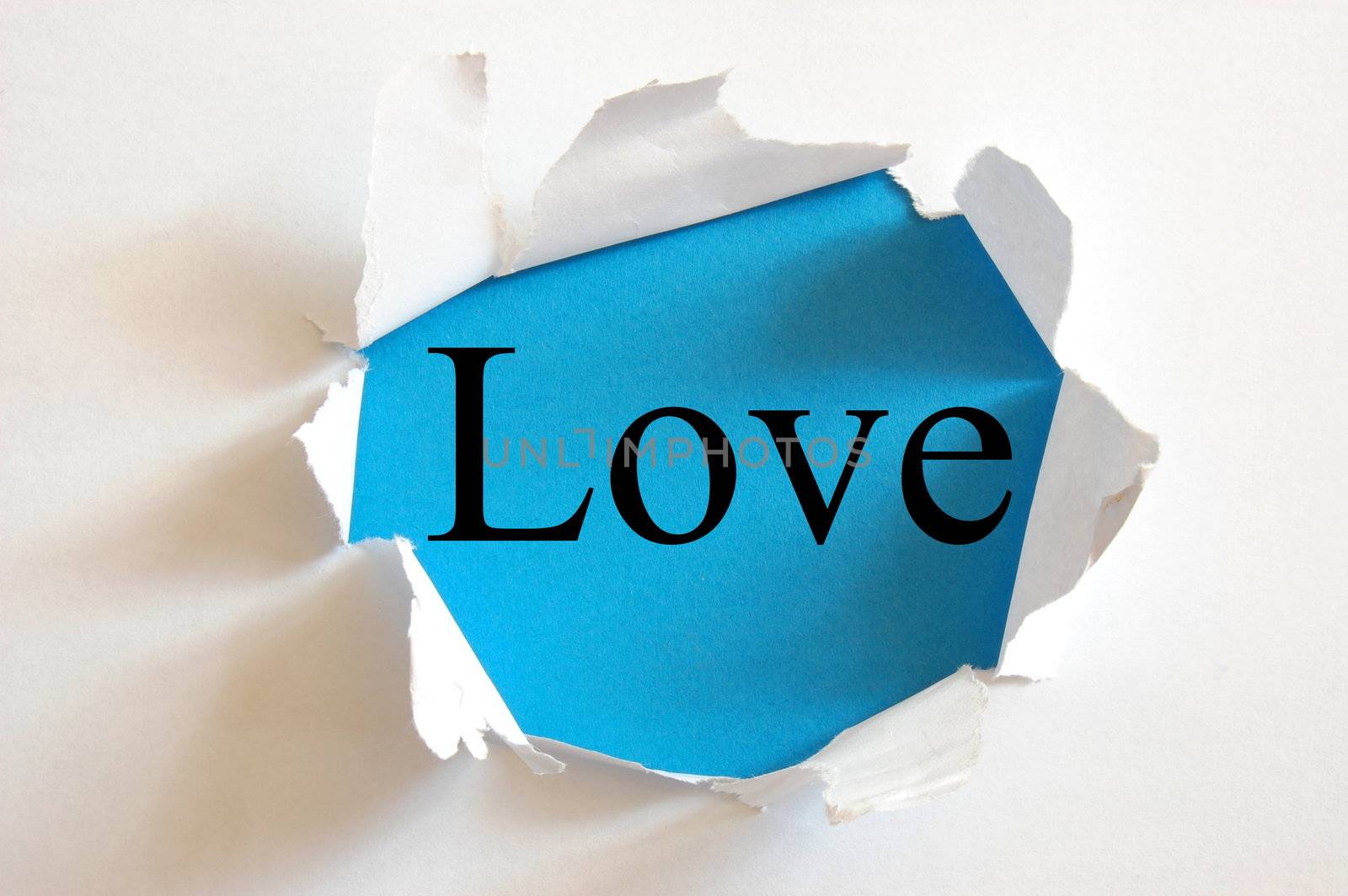 love on blue background in a hole