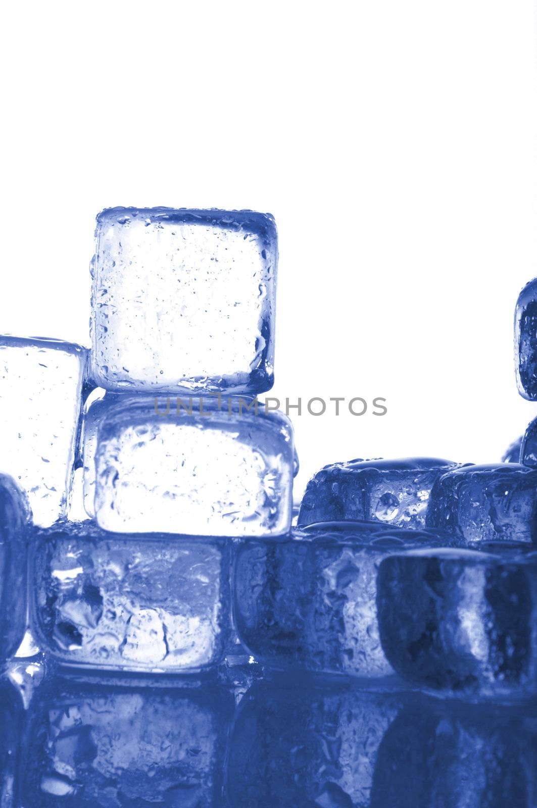 melting ice cubes isolated on white background