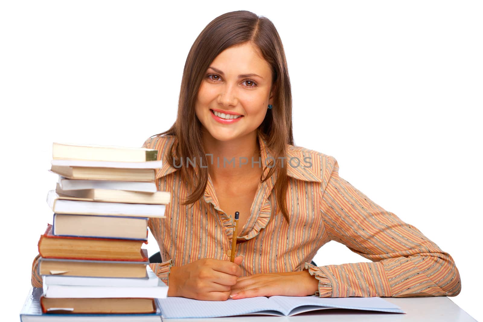 Young female student smiling against white background