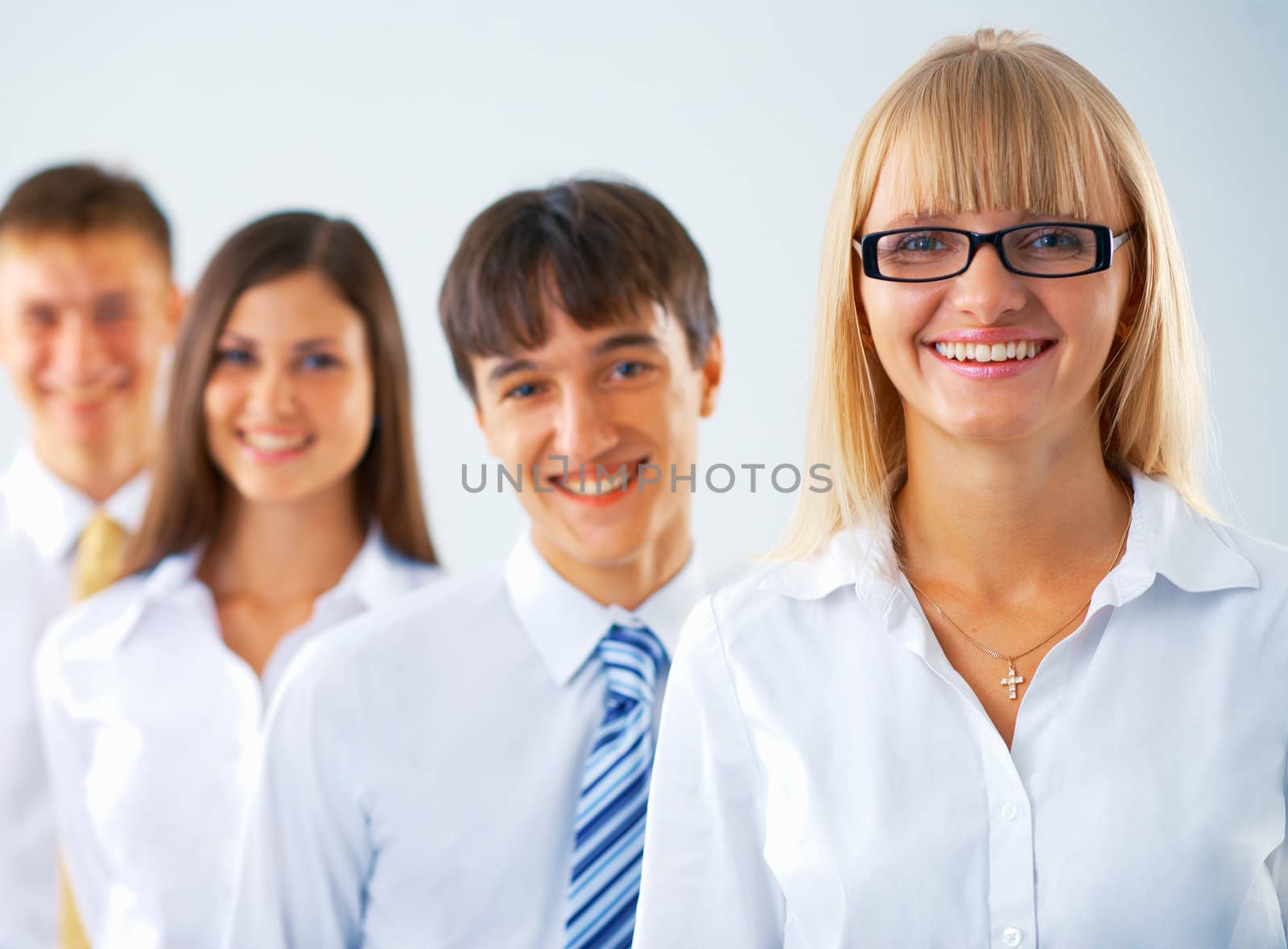  Portrait of happy business group standing in a row