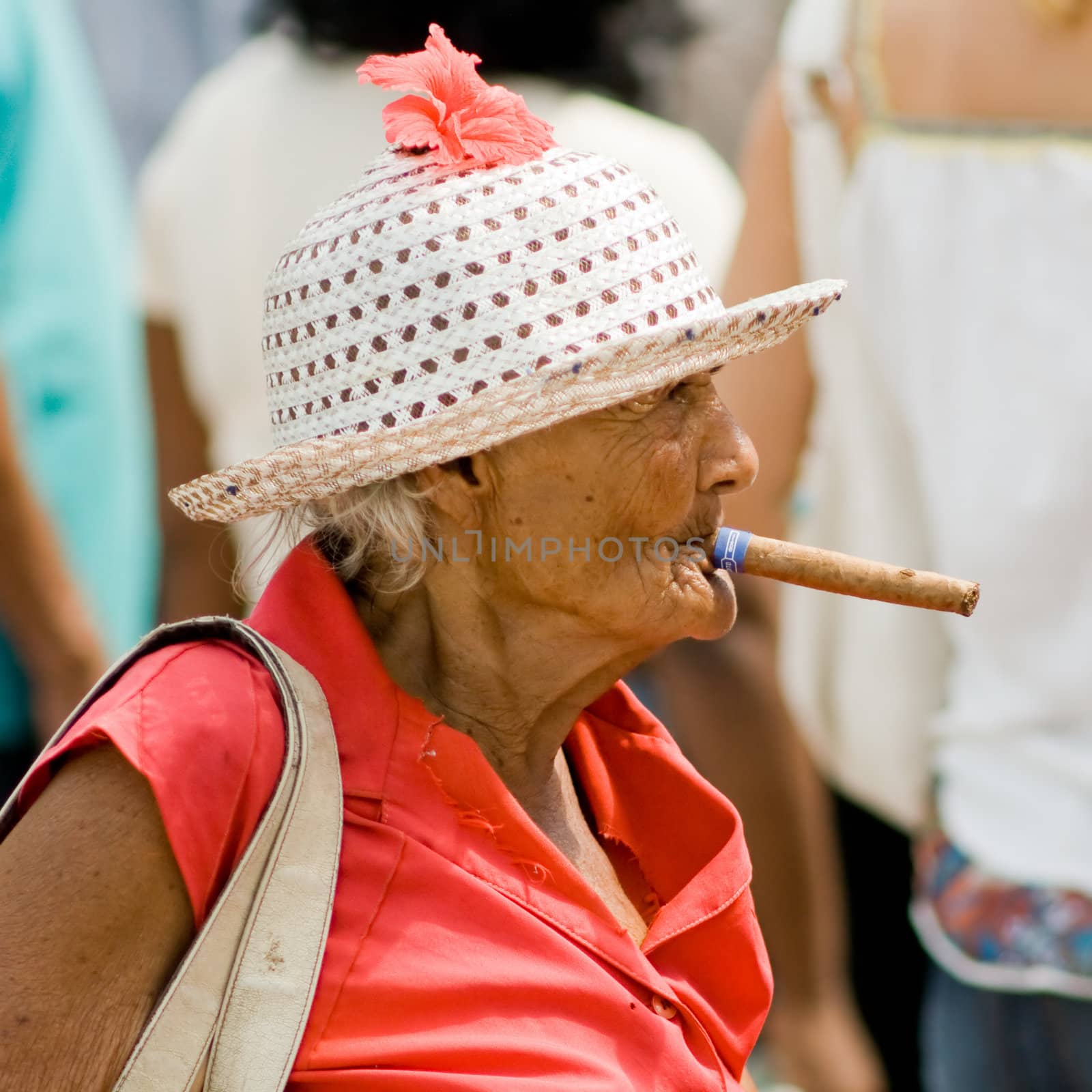 Old wrinkled woman smoking cigar. January 2008, Santiago-de-Cuba. #2