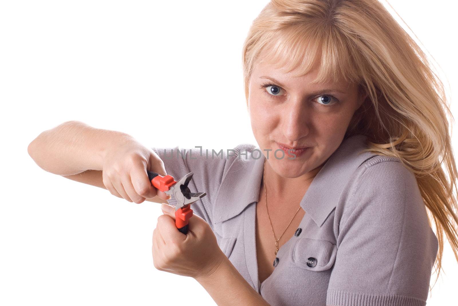 Blond woman posing with pliers