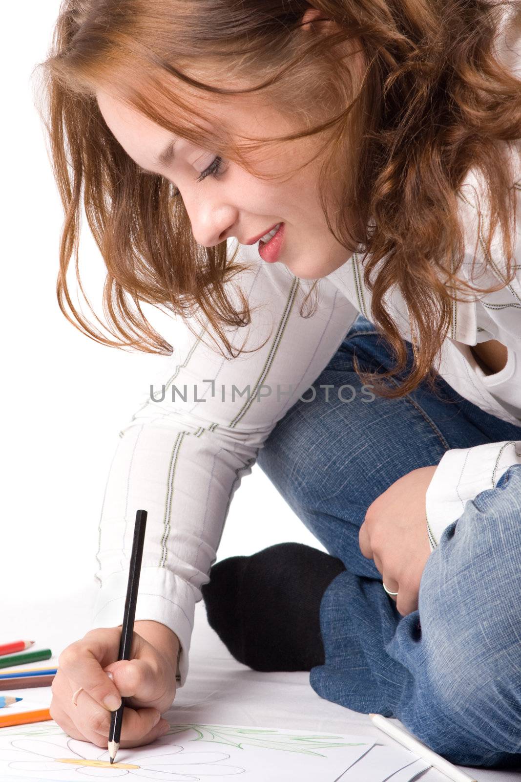 Beautiful girl is drawing with crayons. Isolated on white. #4