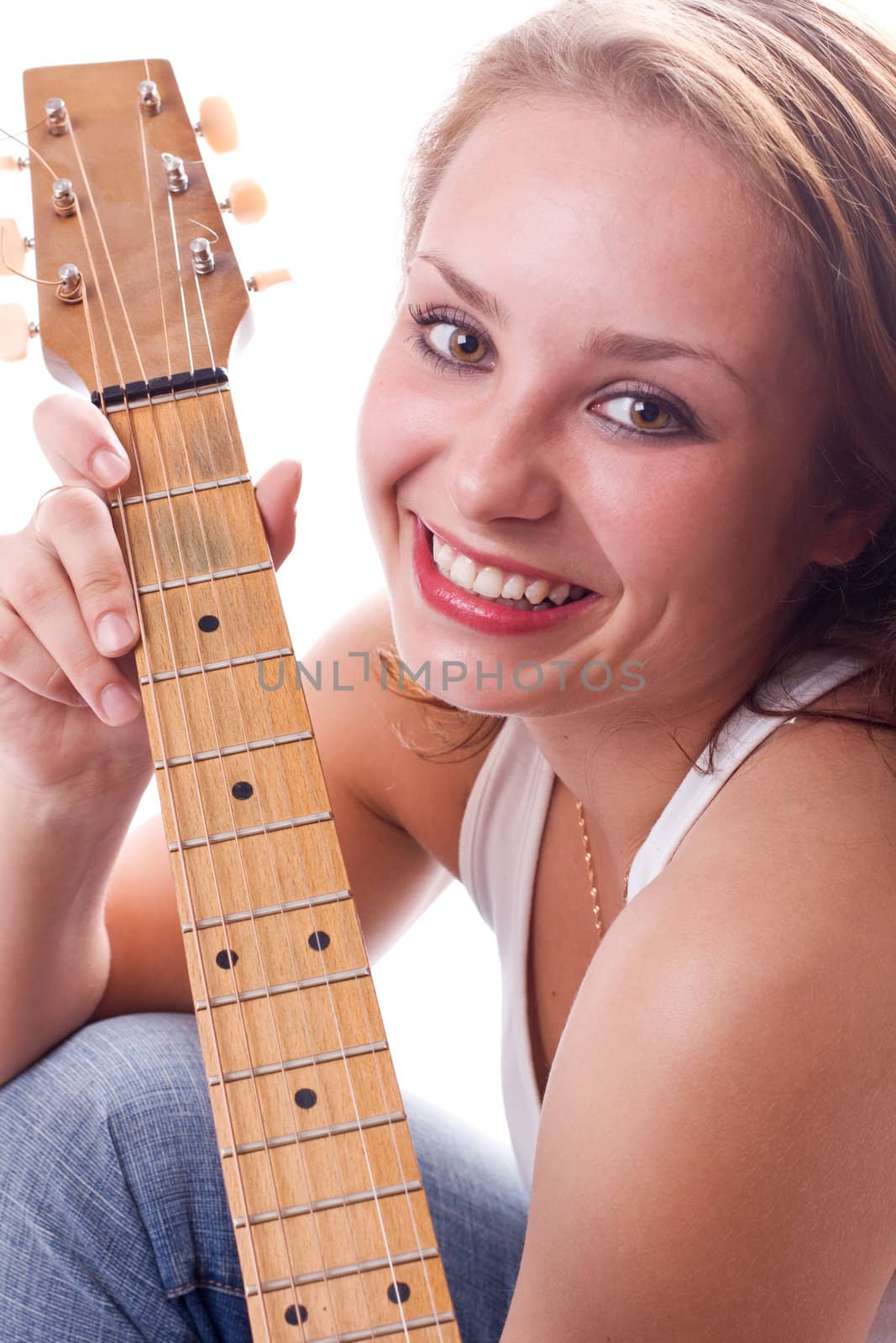 Beautiful girl posing with guitar. Isolated on white. #2