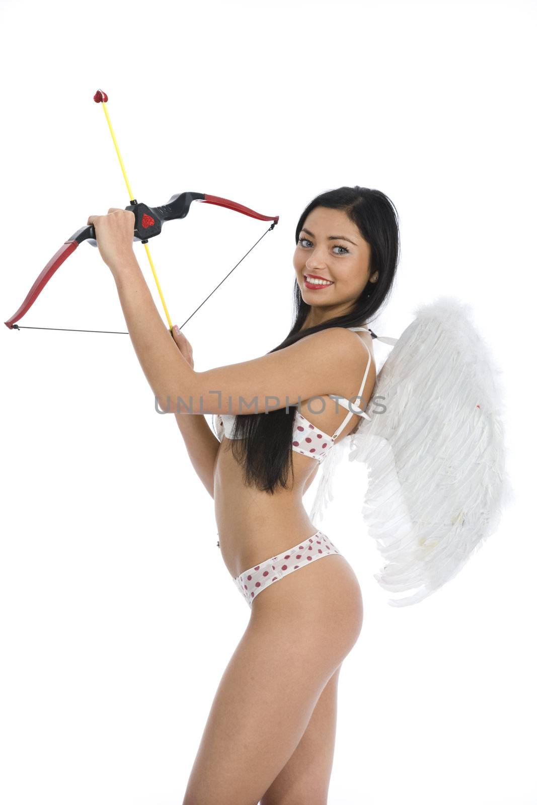 Sexual  Kupedon with bow on insulated background