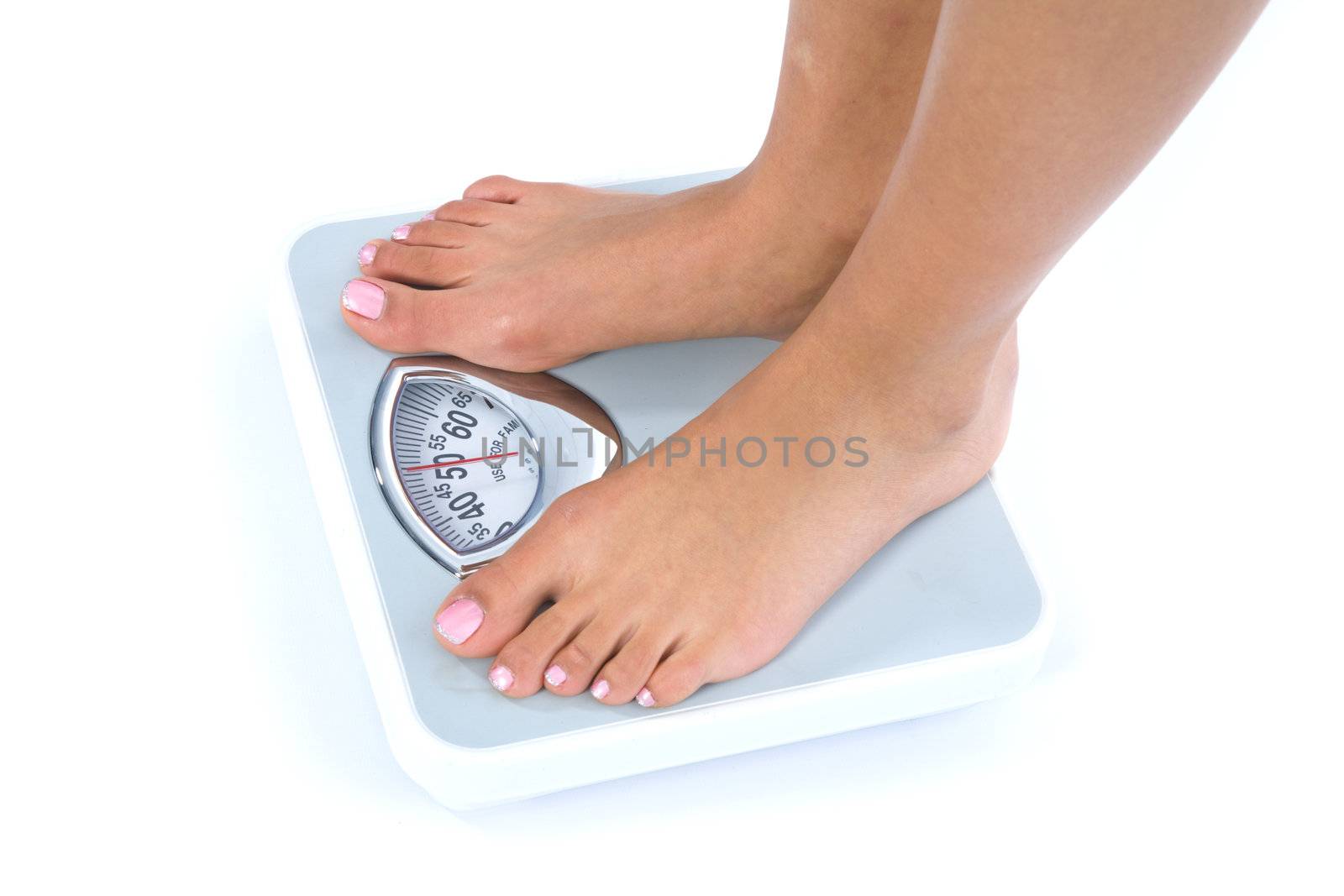 Woman legs with  scales on  isolated background